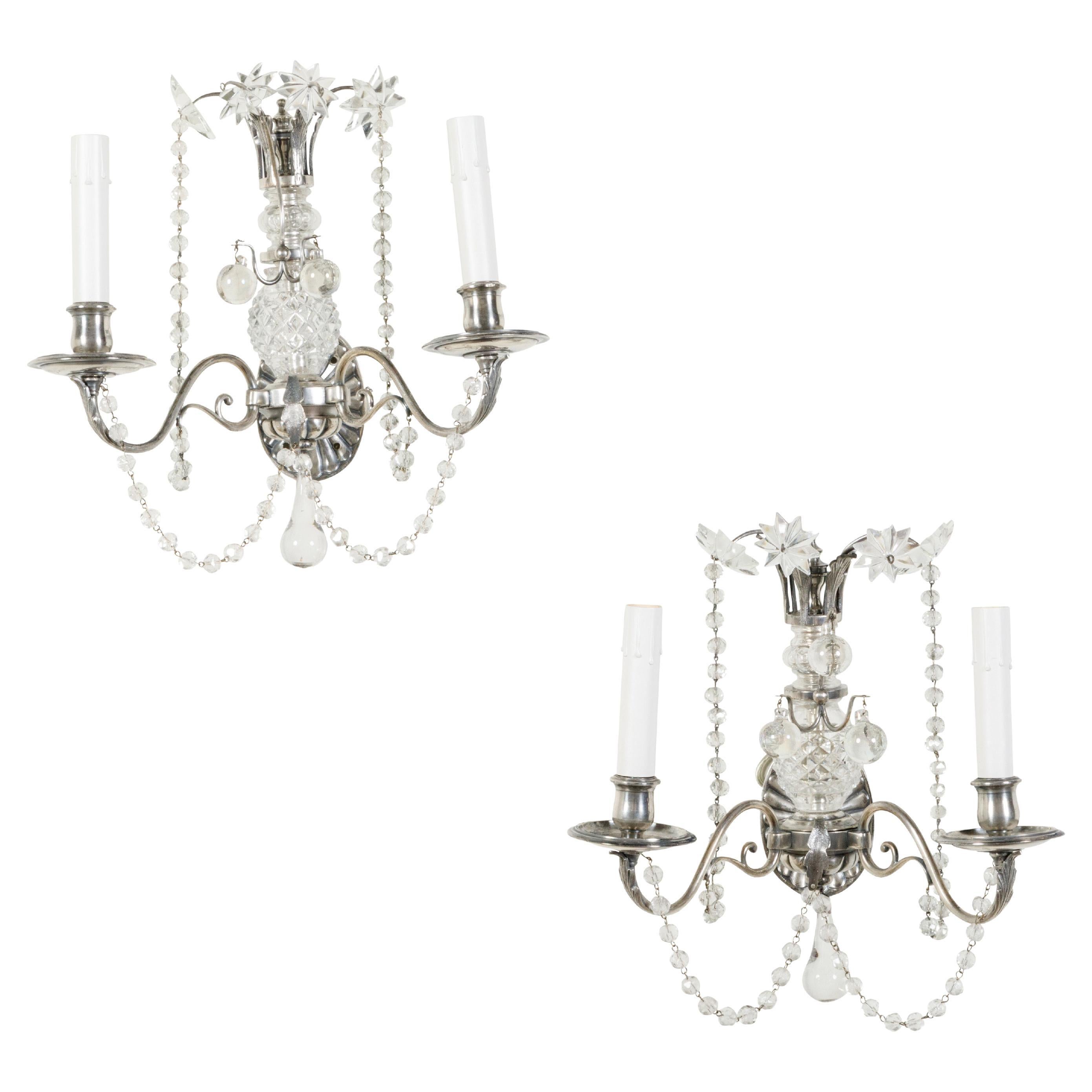 Pair of 1920s Metal and Crystal Two-Arm Wall Sconces with Beads and Rosettes For Sale