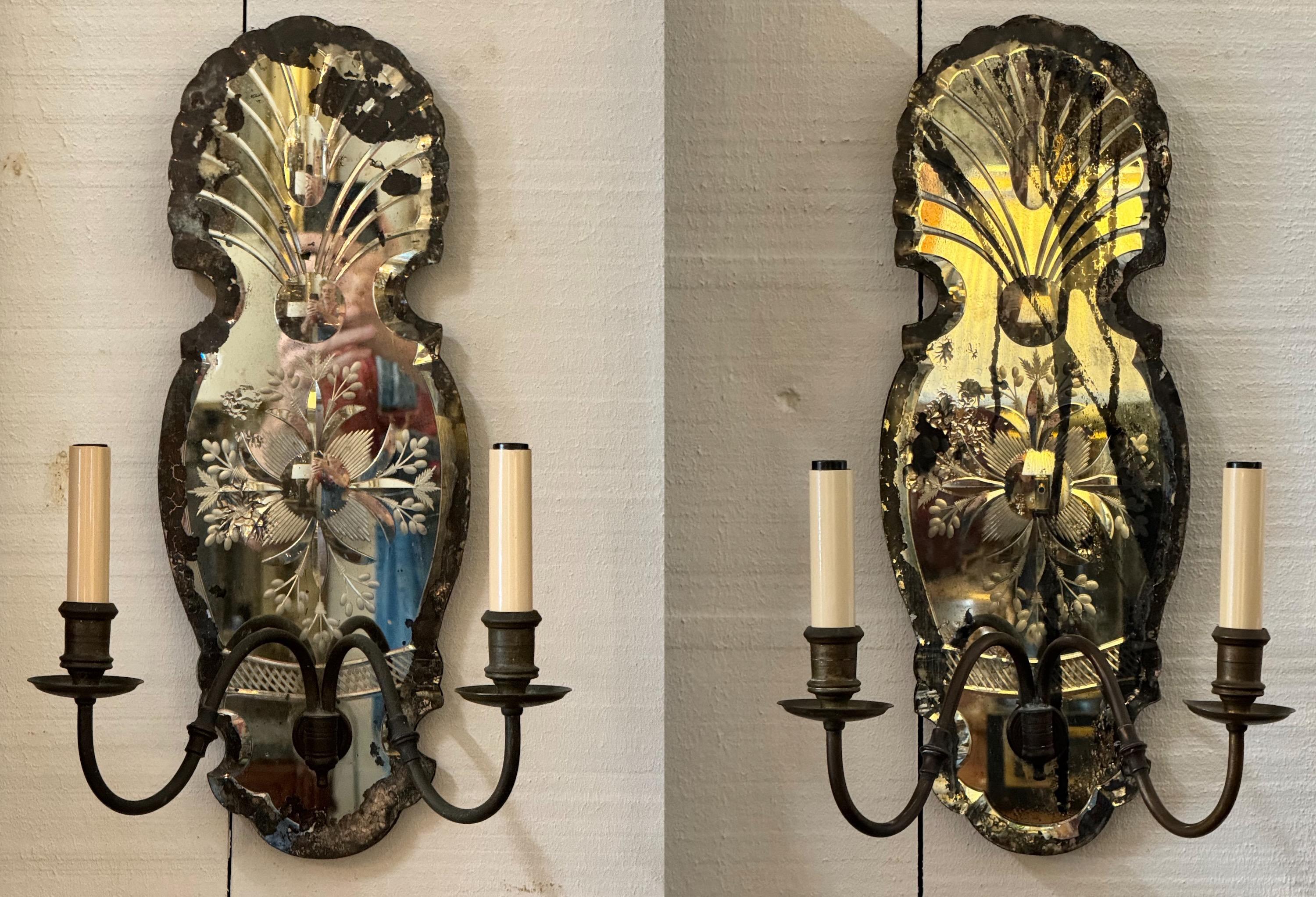 We love mirrored sconces. They add so much charm to any room.