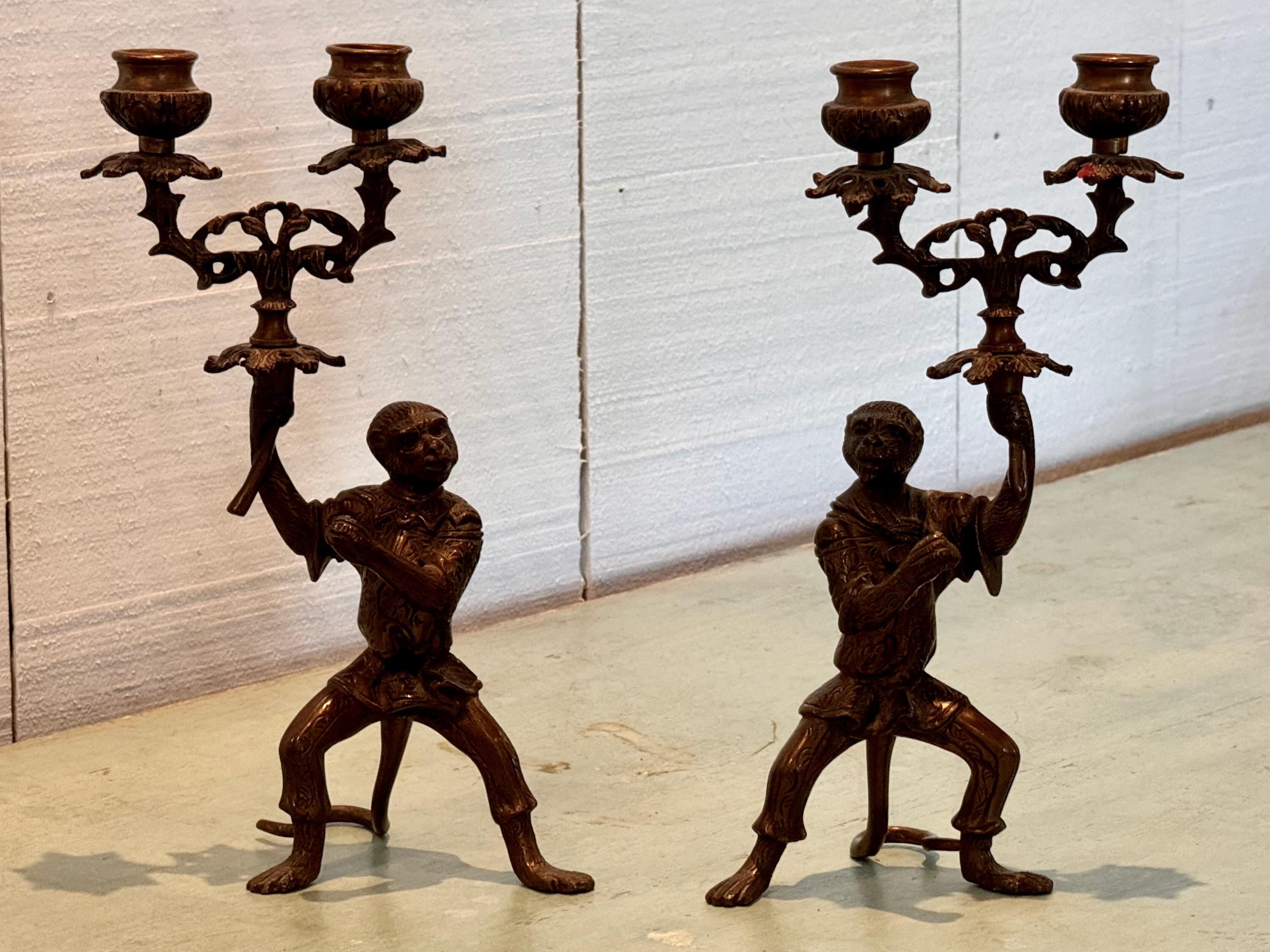 Monkey see. Monkey do. Whimsical Bronze candlesticks for the not so serious decorator.
