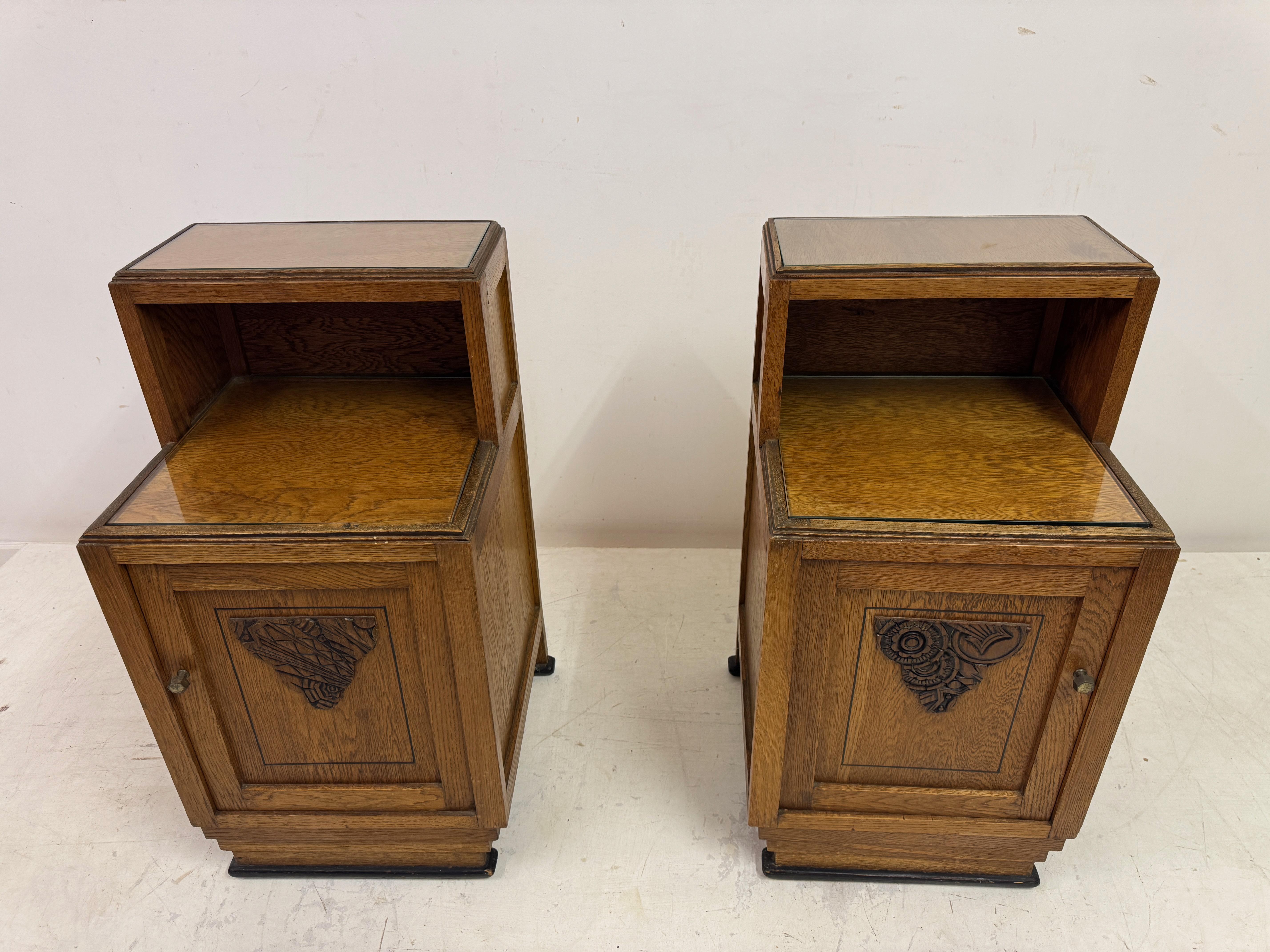 20th Century Pair of 1920s Oak Bedside Cabinets with Carved Panels For Sale