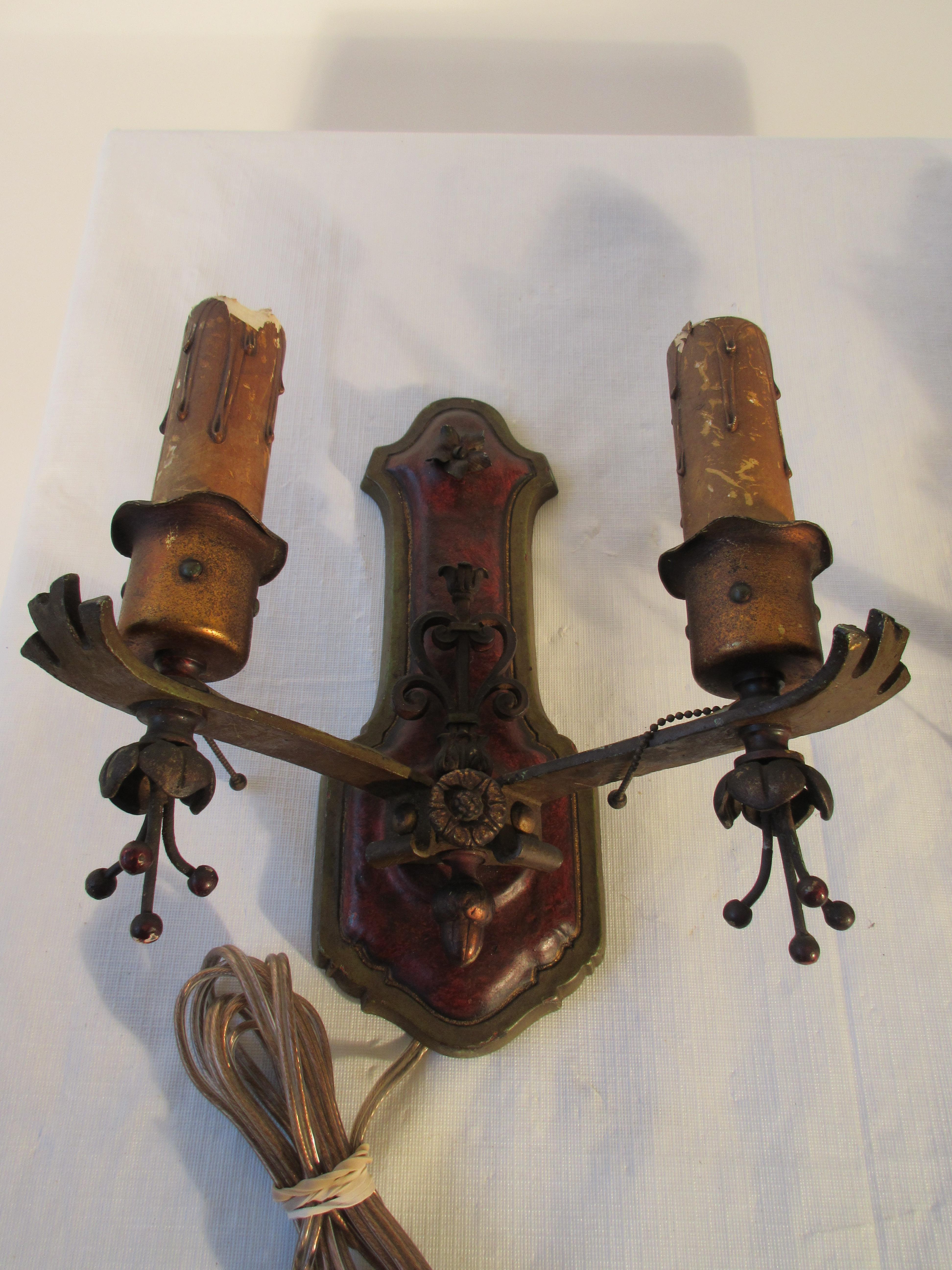 Pair of 1920s painted iron sconces.