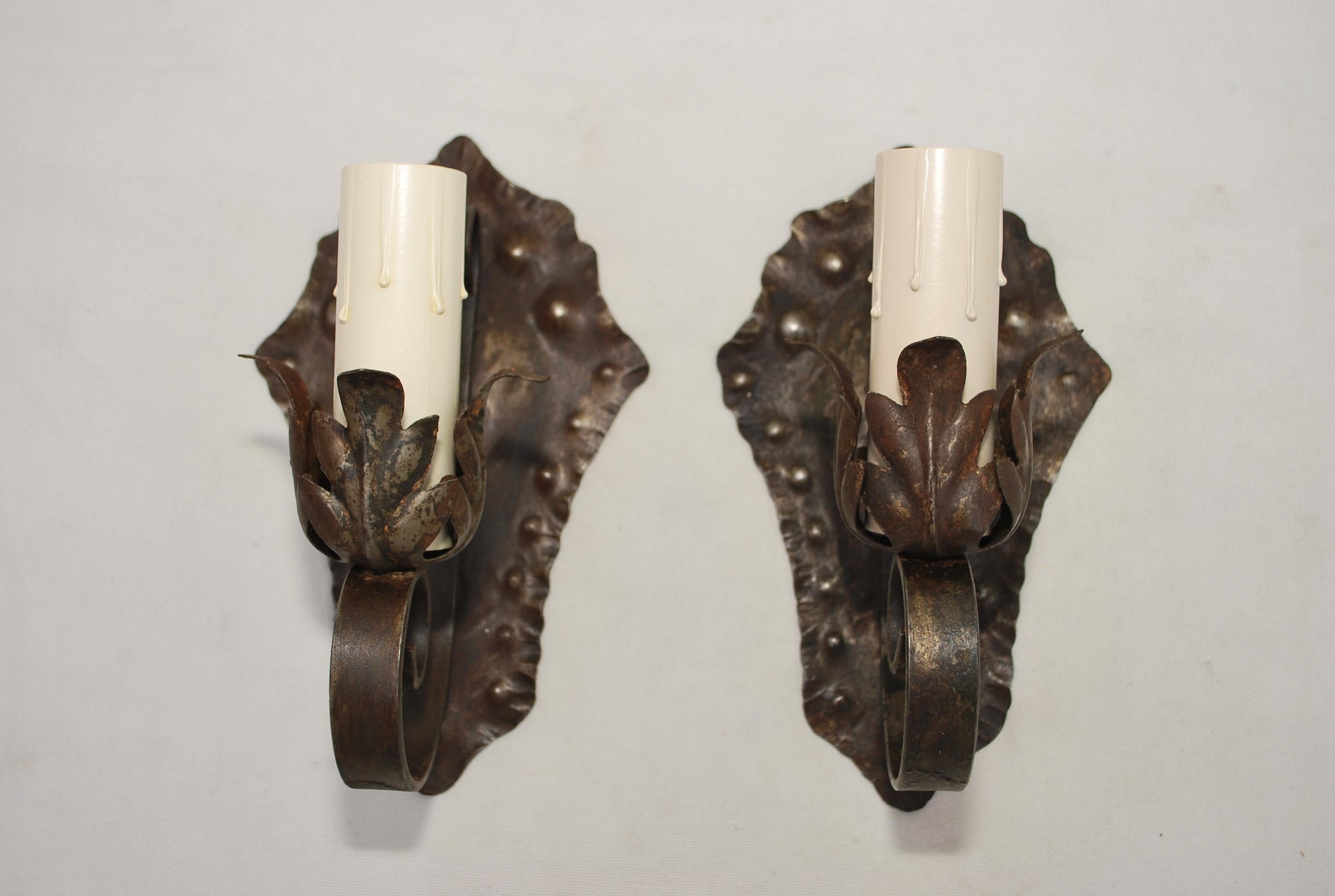 A very nice and rustic 1920's wrought iron sconces
