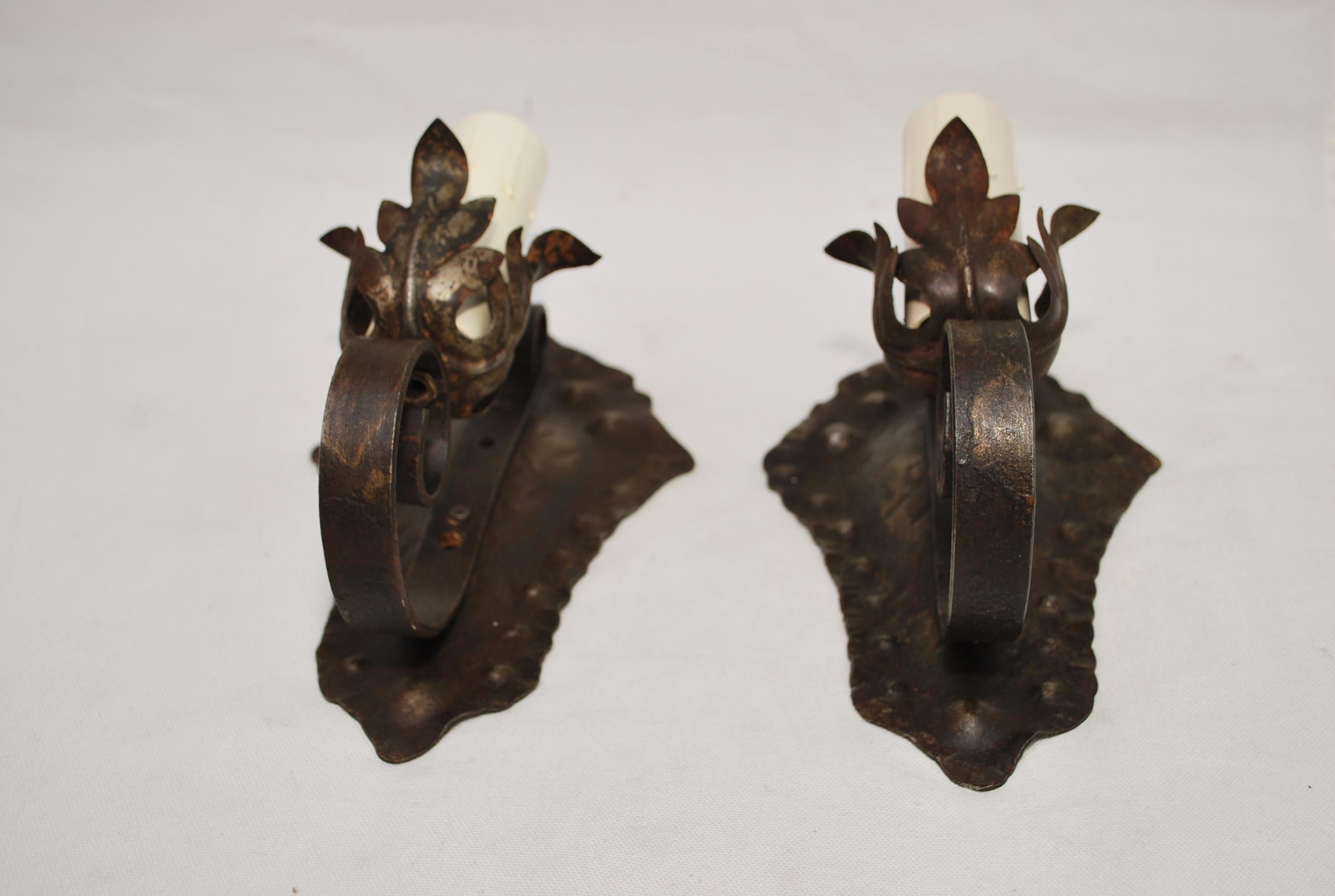 Spanish Colonial Pair of 1920's rustic wrought iron sconces