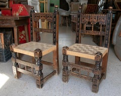 Pair of 1920s Spanish Hand Carved Painted Wooden Chairs w/ Woven Bulrush Seats
