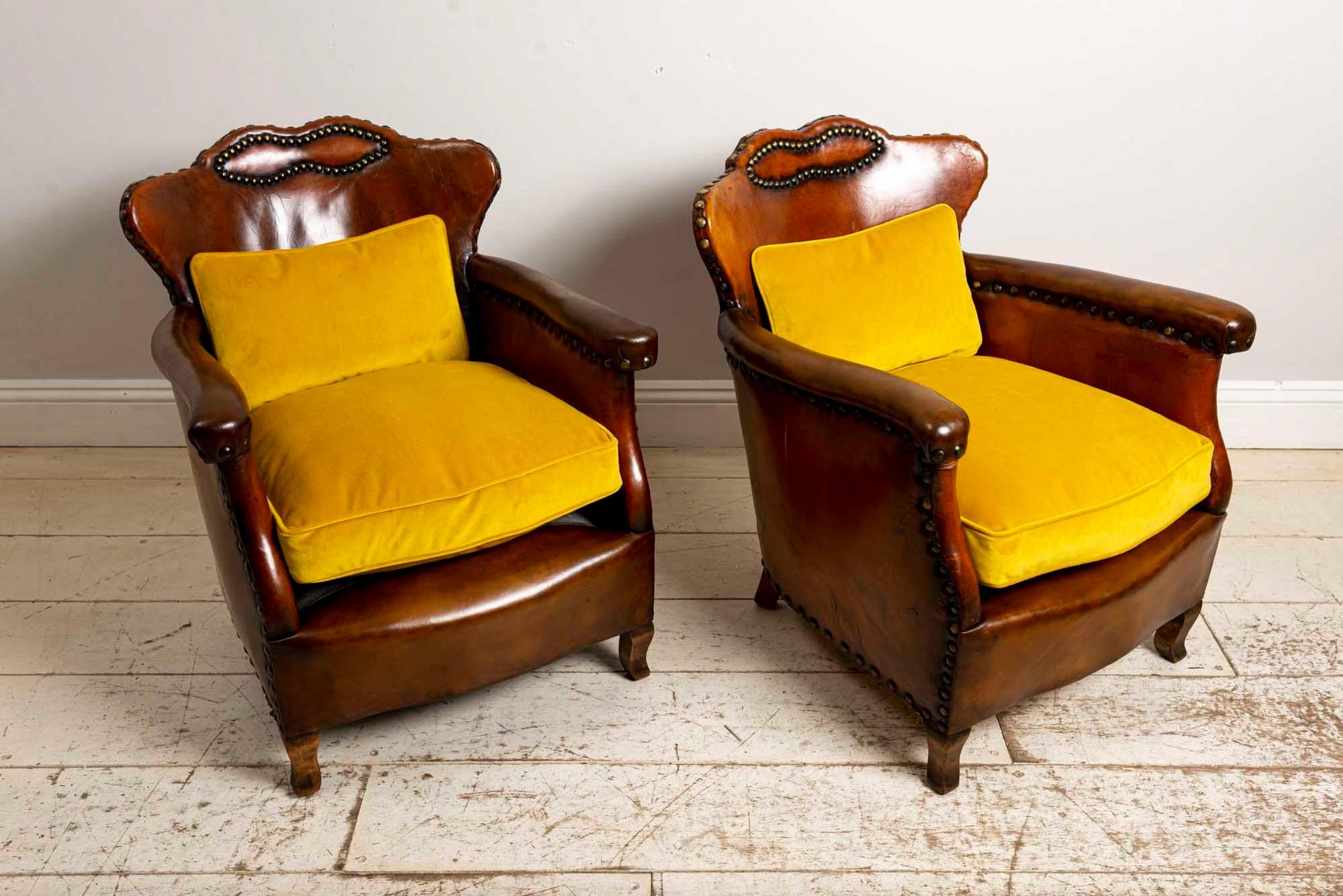 Pair of 1920s Swedish leather club chairs by Otto Schulz, with studded detail and gold velvet cushions.
Otto Schulz was a German architect and designer who operated the interior design shop Boet in Gothenburg during the 1920s-1950s.
Otto played an