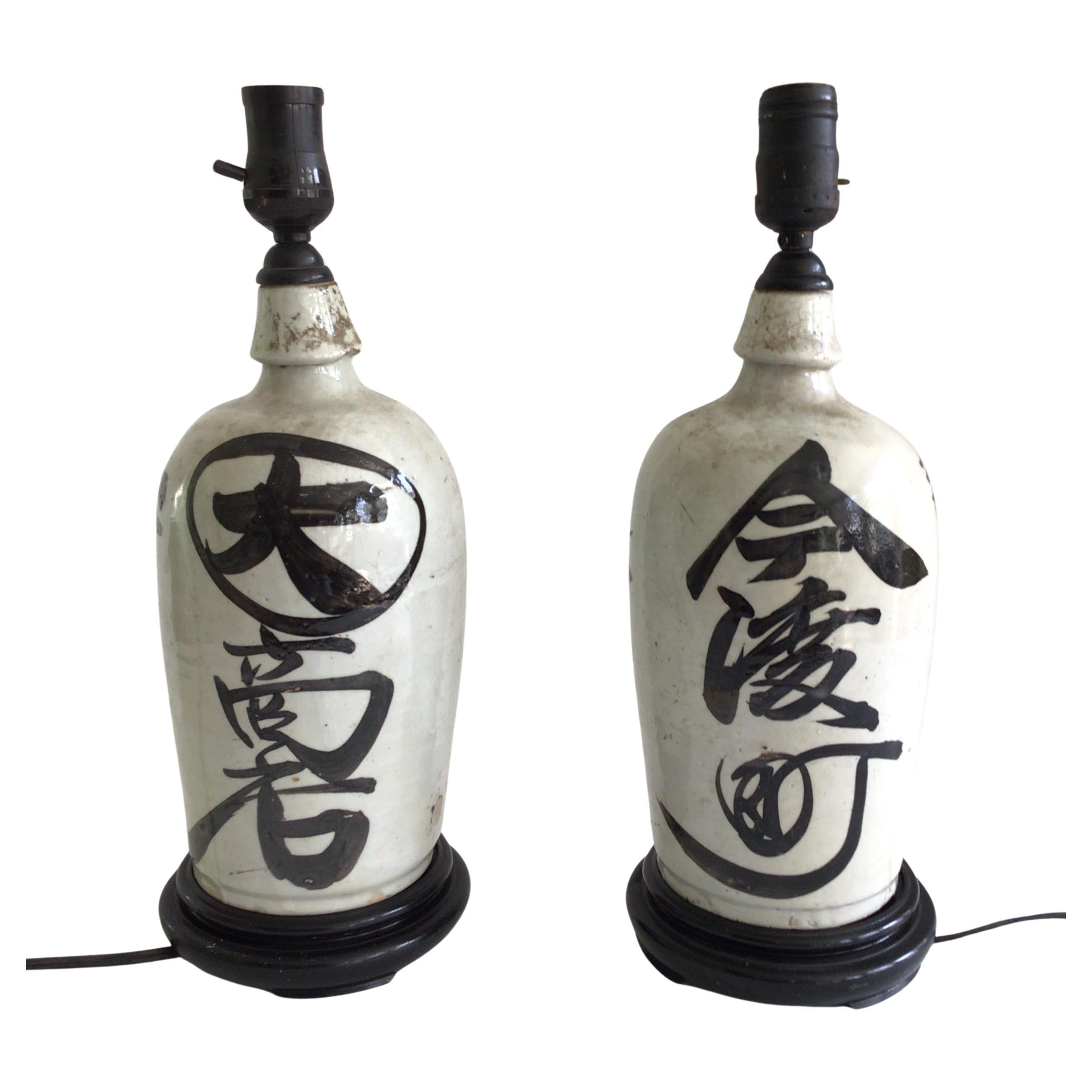 Pair of 1920s Table Lamps Made From Sake Jugs on Wood Base For Sale