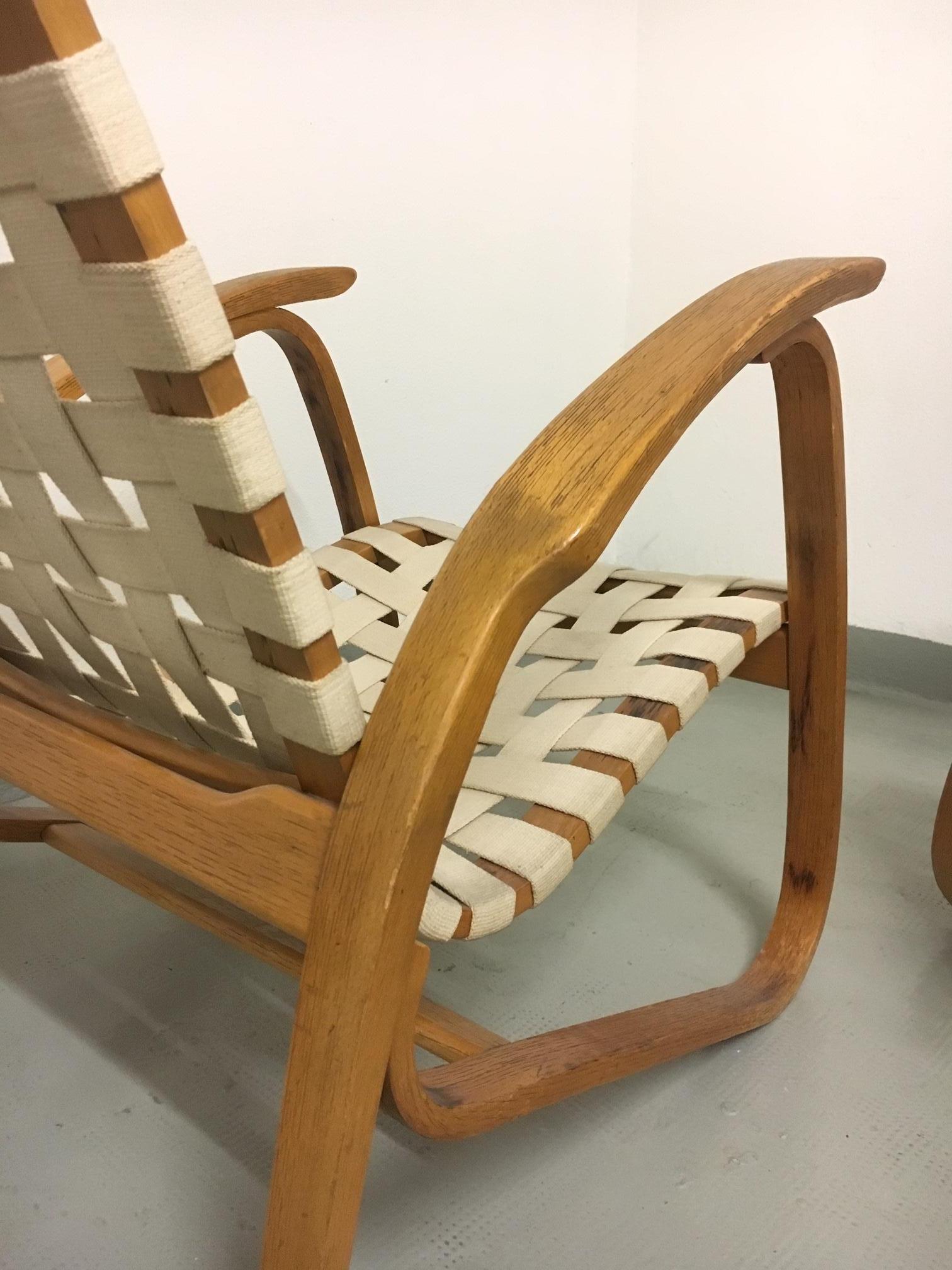 Beech Pair of 1930s Bentwood, woven straps Armchairs by Jan Vanek. 