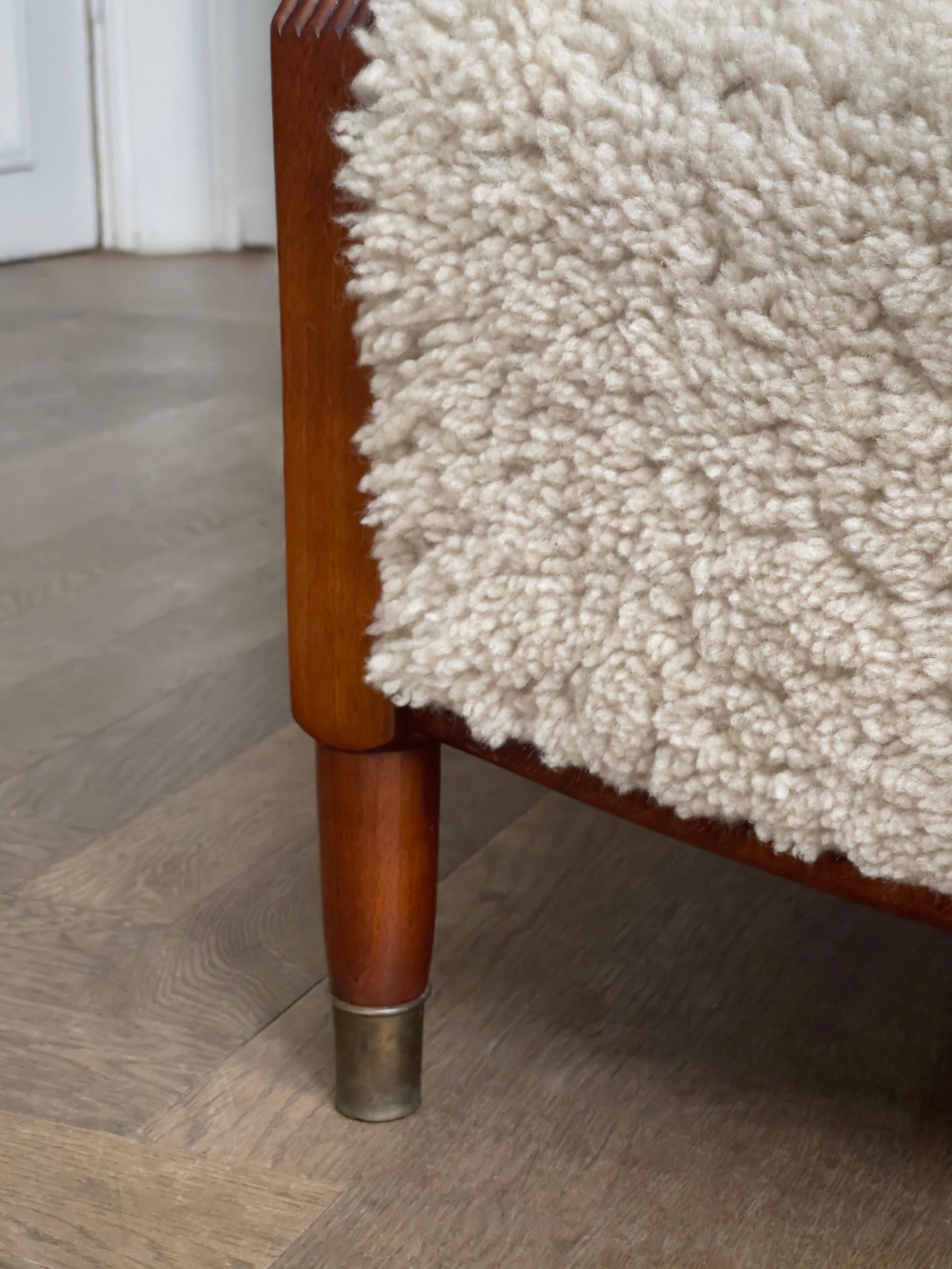 Danish Pair of 1930s Art Deco danish lounge chairs reupholstered in natural sheepskin. For Sale