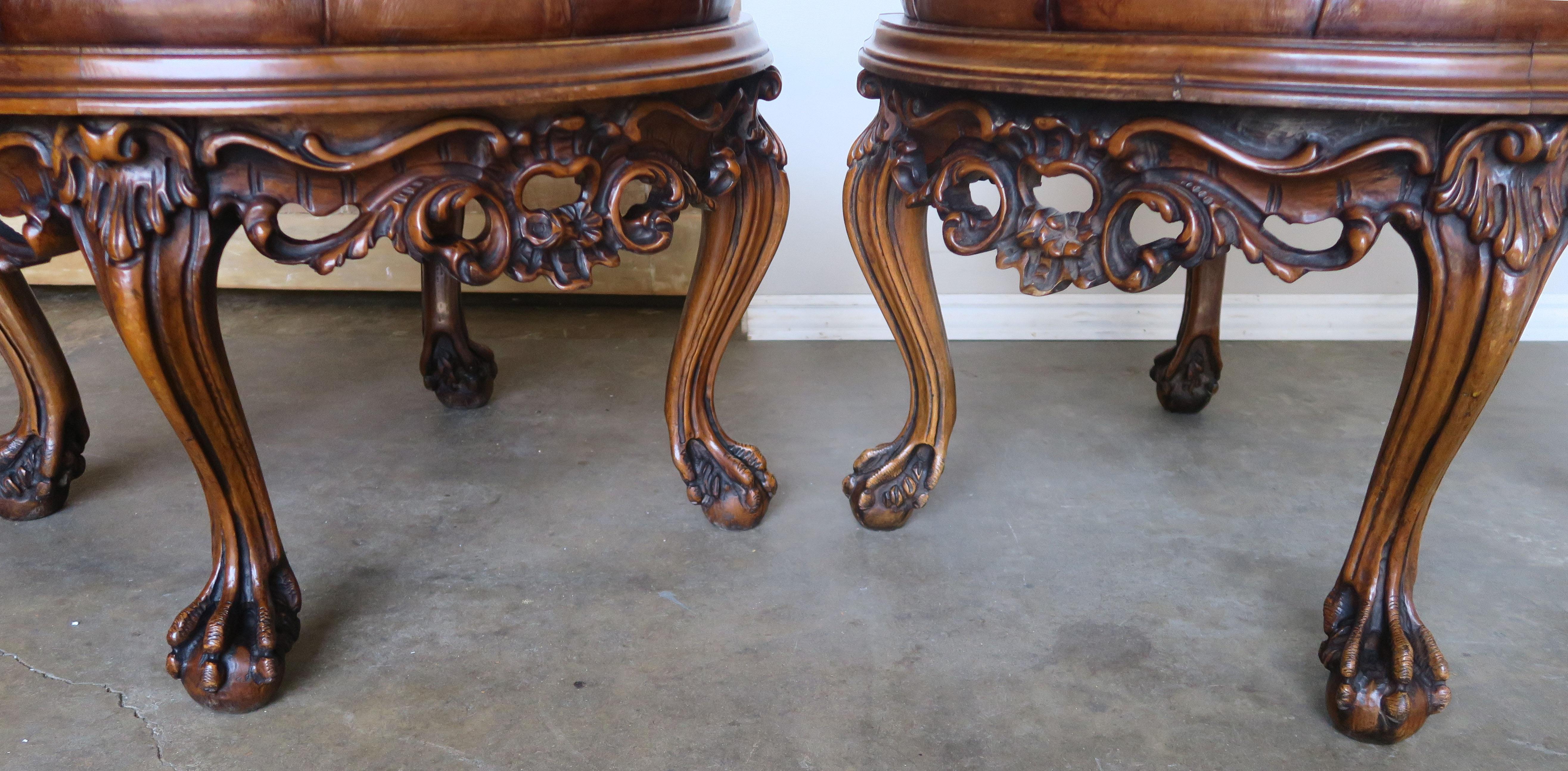 Pair of 1930s Carved Walnut Leather Tufted Ottomans 3