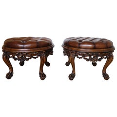 Vintage Pair of 1930s Carved Walnut Leather Tufted Ottomans