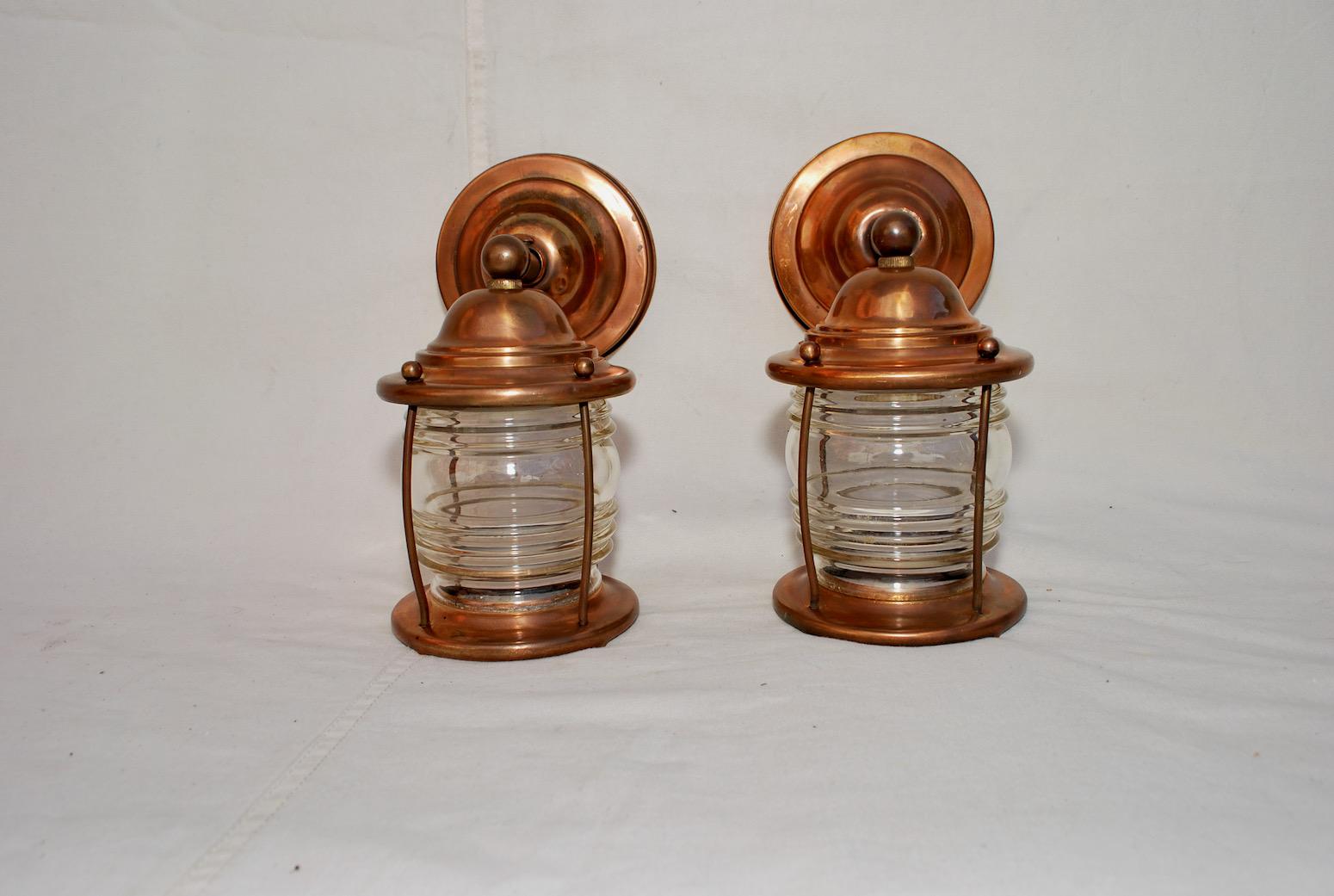 A very nice and cute pair of copper outdoor sconces.