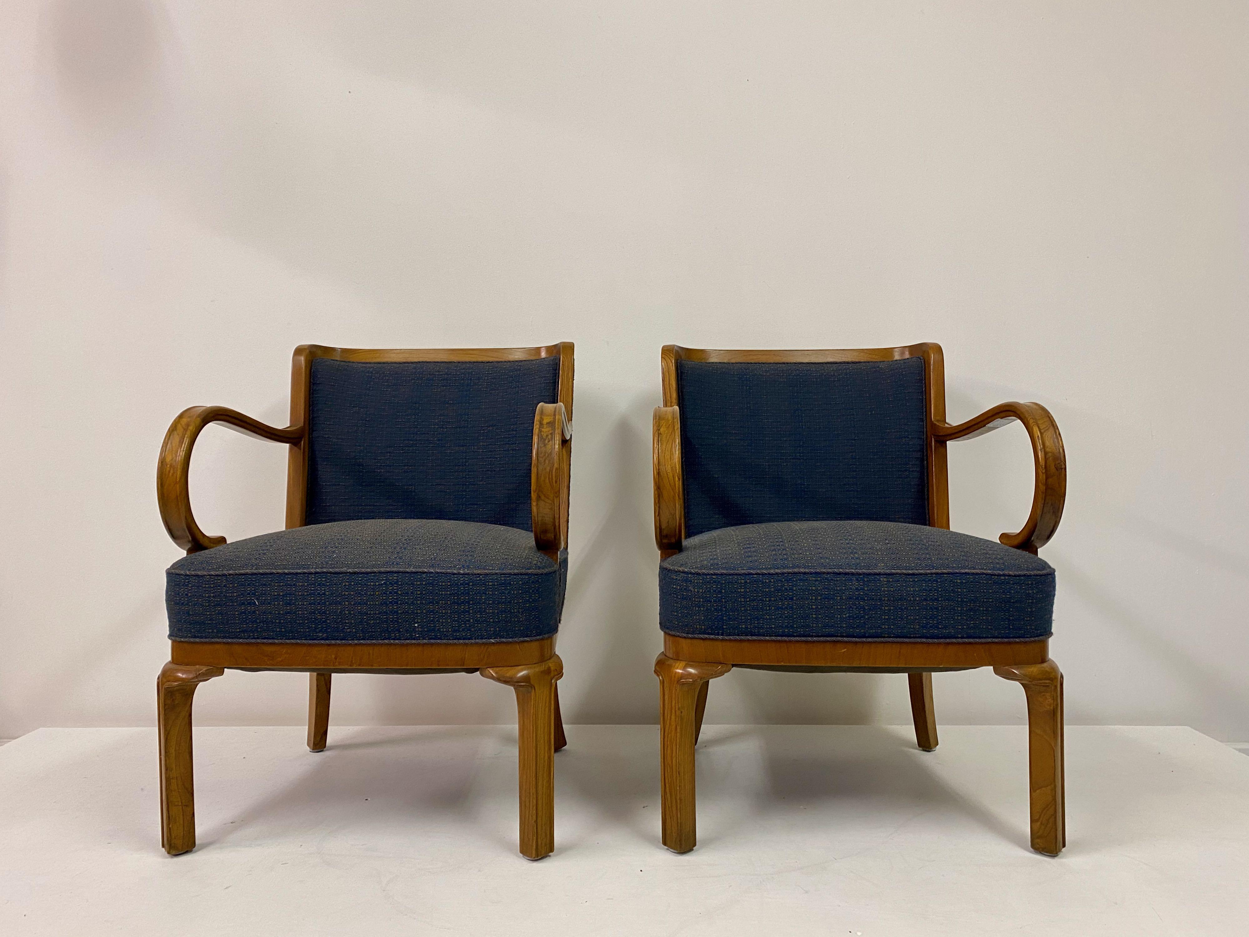A pair of armchairs by Lysberg and Hansen. 

Elm frame.

Wool upholstery. 

Similar chairs seen in Grete Jalk: The Copenhagen Cabinetmakers Guild Exhibitions 1927-1966, Vol 1, Pg 85. 

Danish, 1930s

Measure: Seat height 43cm.