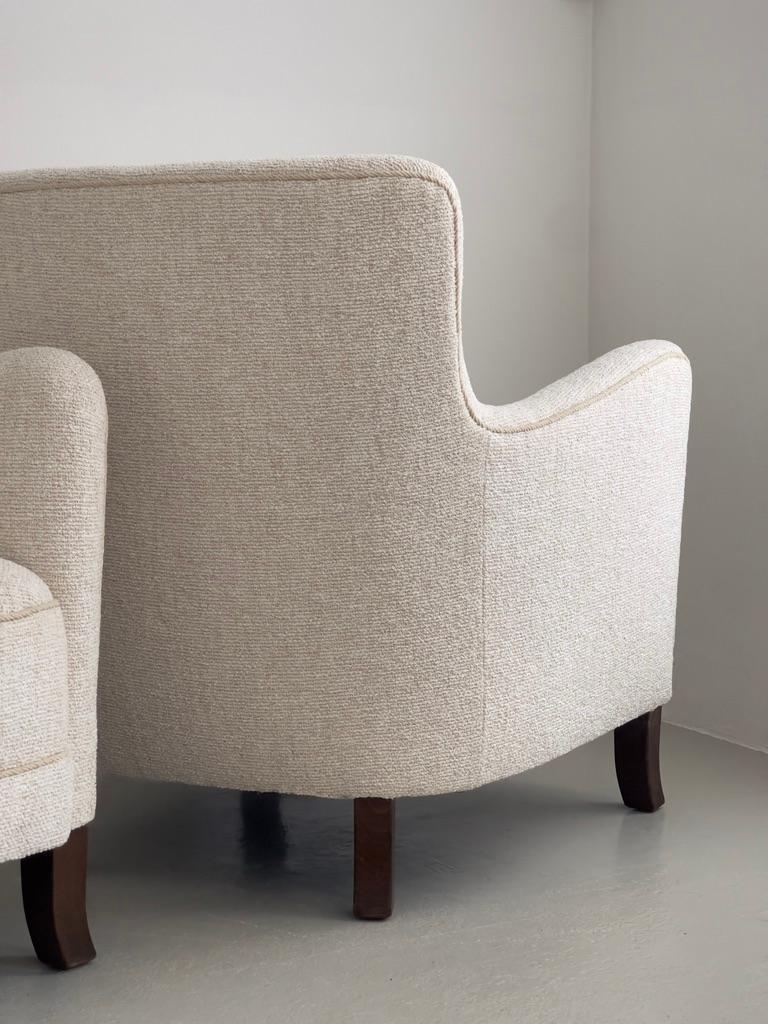 Pair of 1930s danish cabinet maker lounge chairs reupholstered in Kvadrat bouclé For Sale 1