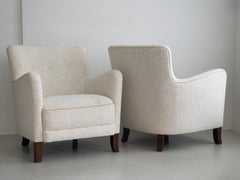 Pair of 1930s danish cabinet maker lounge chairs reupholstered in premium bouclé