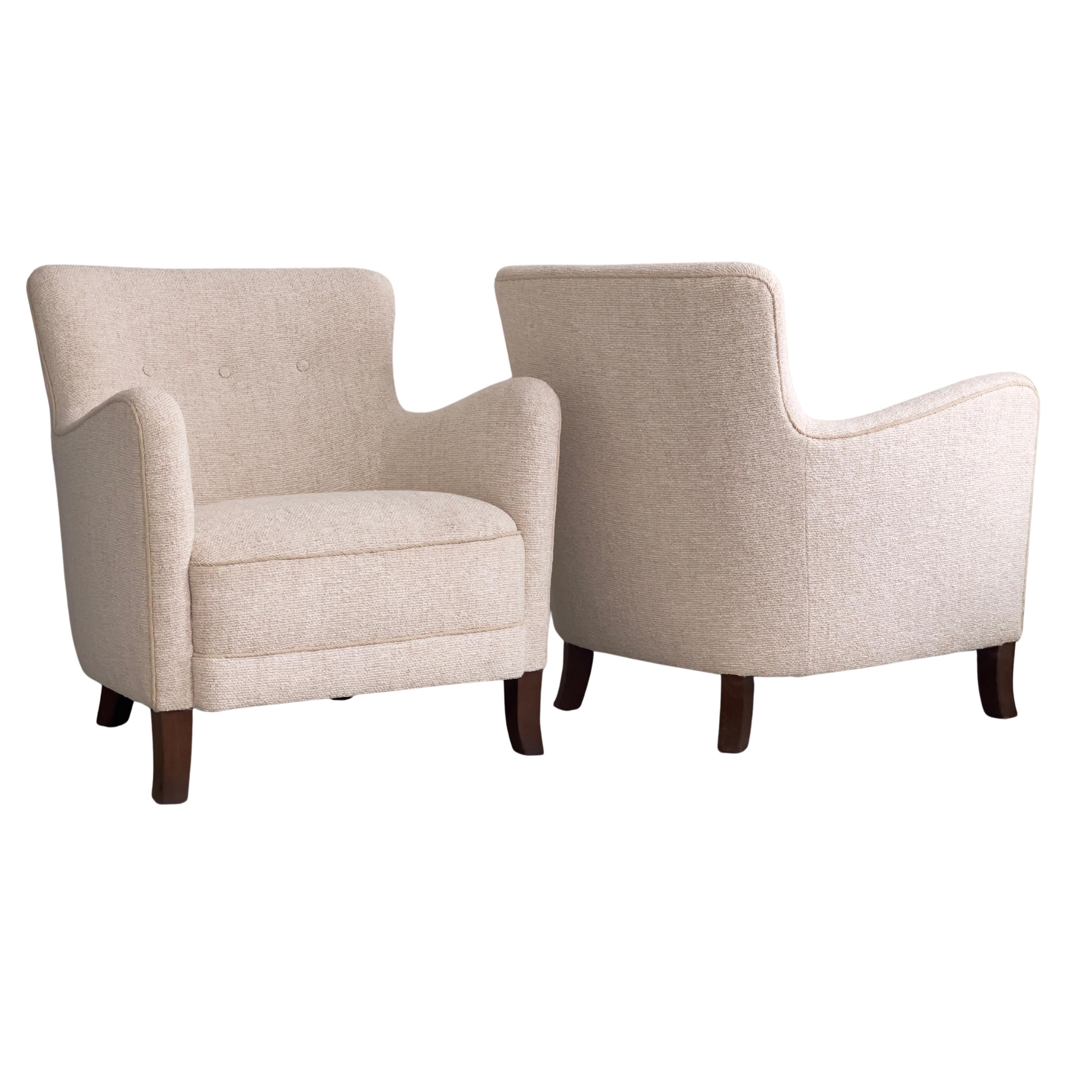 Pair of 1930s danish cabinet maker lounge chairs reupholstered in Kvadrat bouclé For Sale