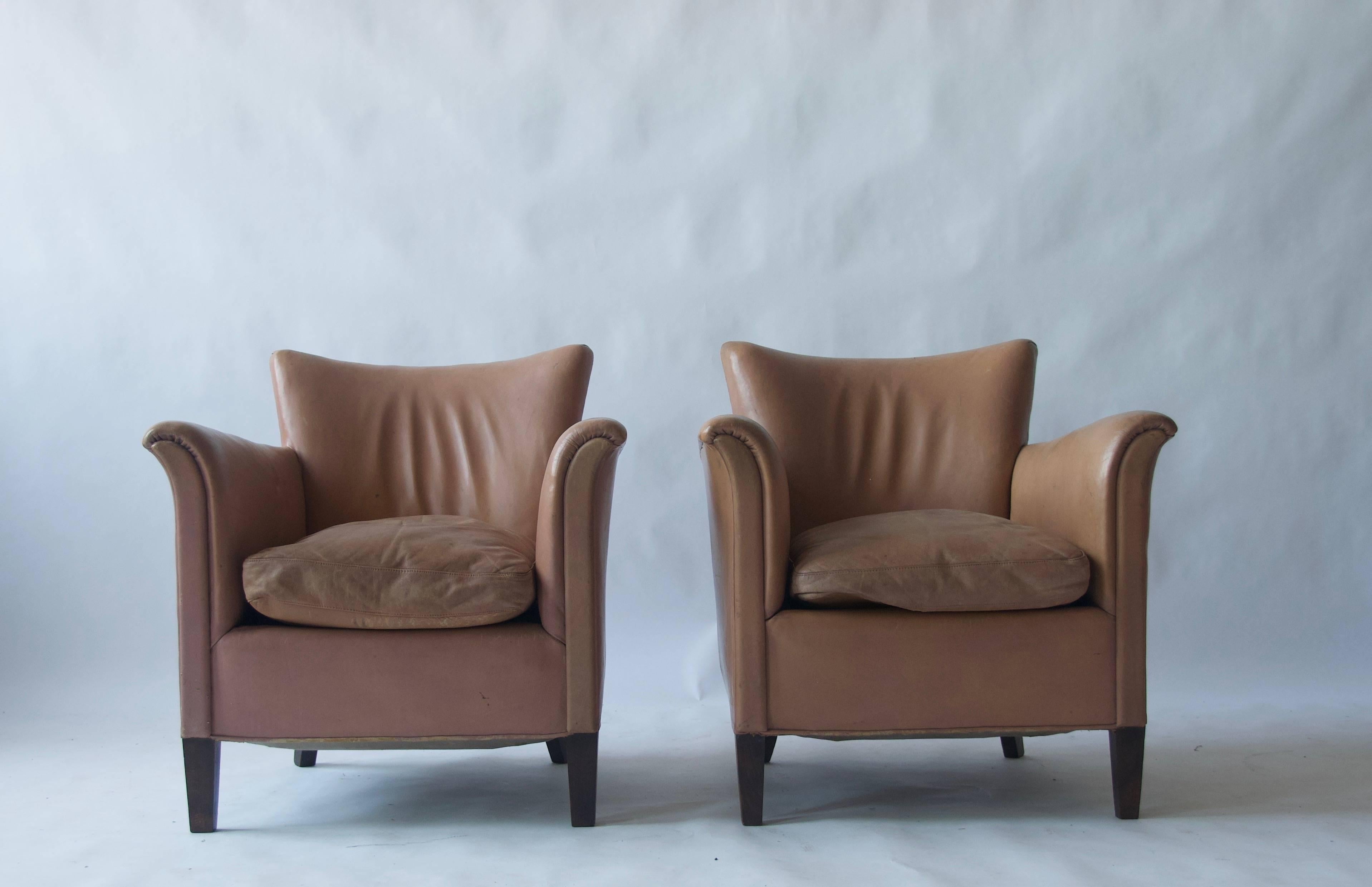 Pair of 1930s Danish leather club chairs.
(Last 2 images are examples of the same pair of chairs and not included in the listing).