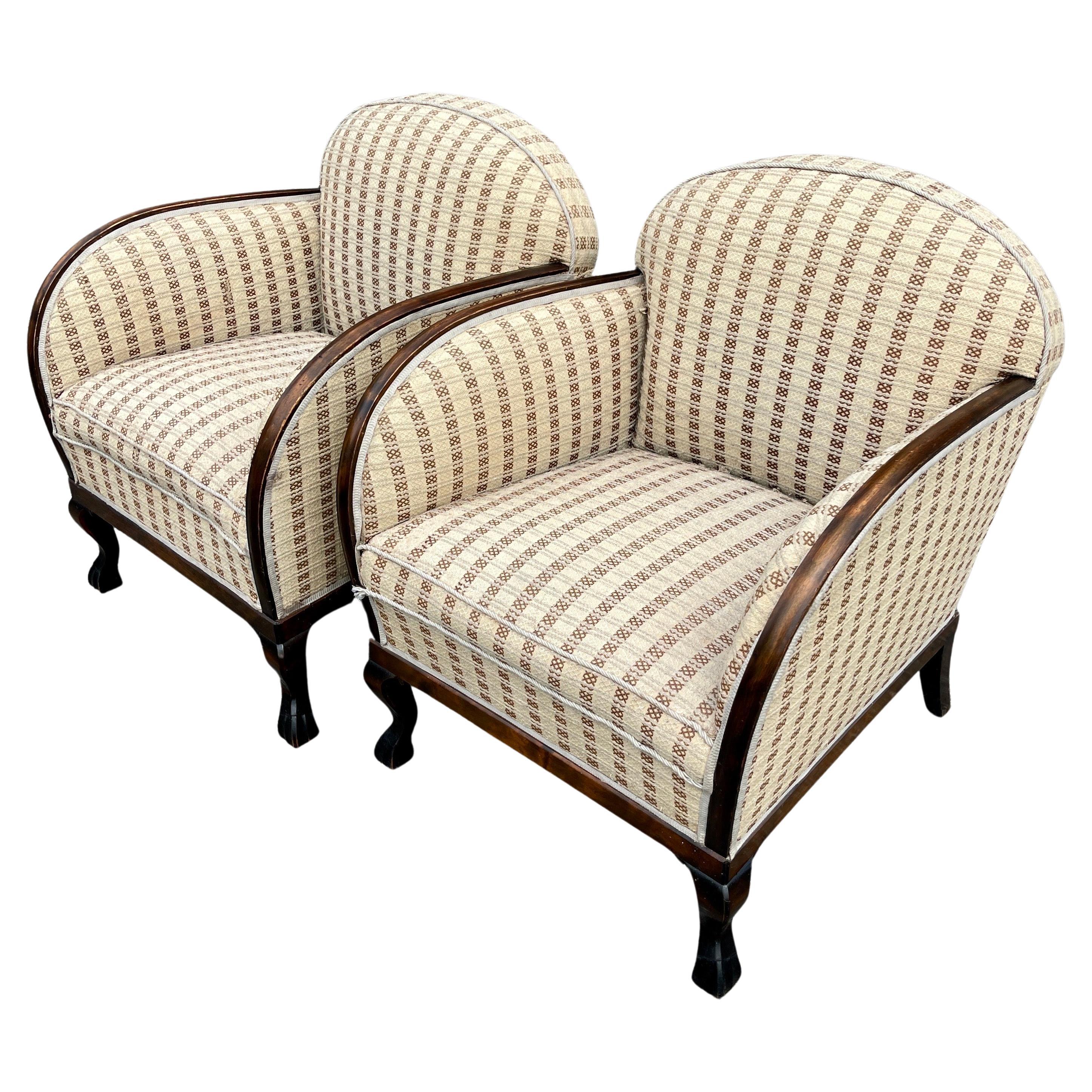 French Art Deco Pair of Lounge Chairs, 1930's
 
This vintage pair has wonderful curves and details. They are a very solid pair with their original upholstery. These club chairs have great presence to them as is but could also redone. 