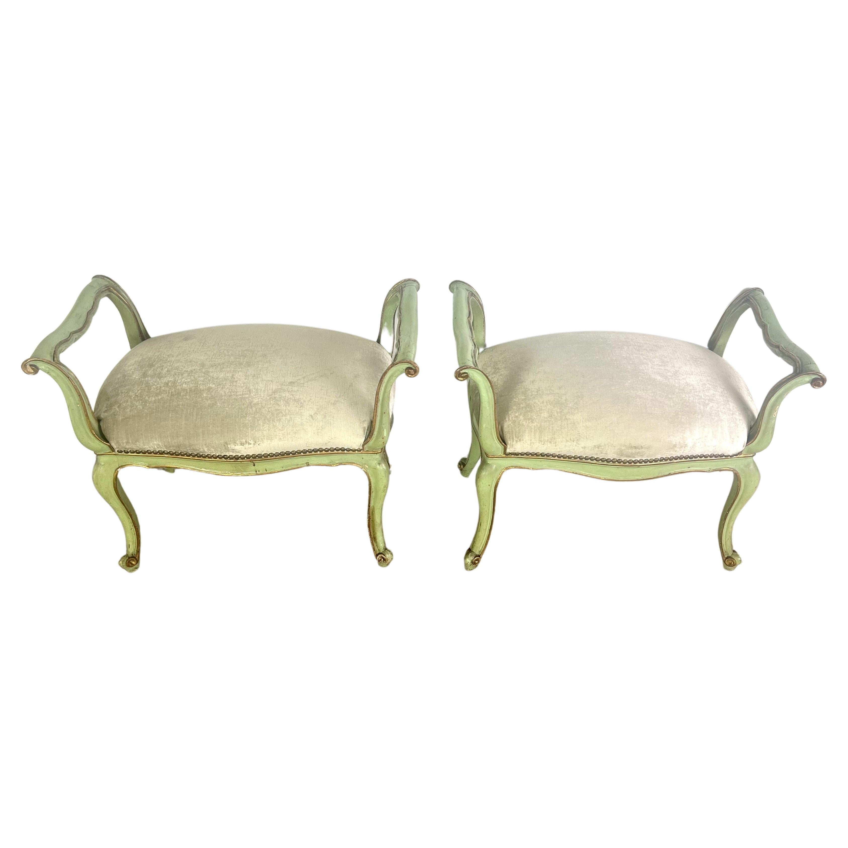 This pair of 1930's Louis XV style French benches is a charming representation of the period's elegance and artful design.  The pistachio green paint on the wood frames adds a fresh, vibrant touch to the classic form, lending the benches a cheerful