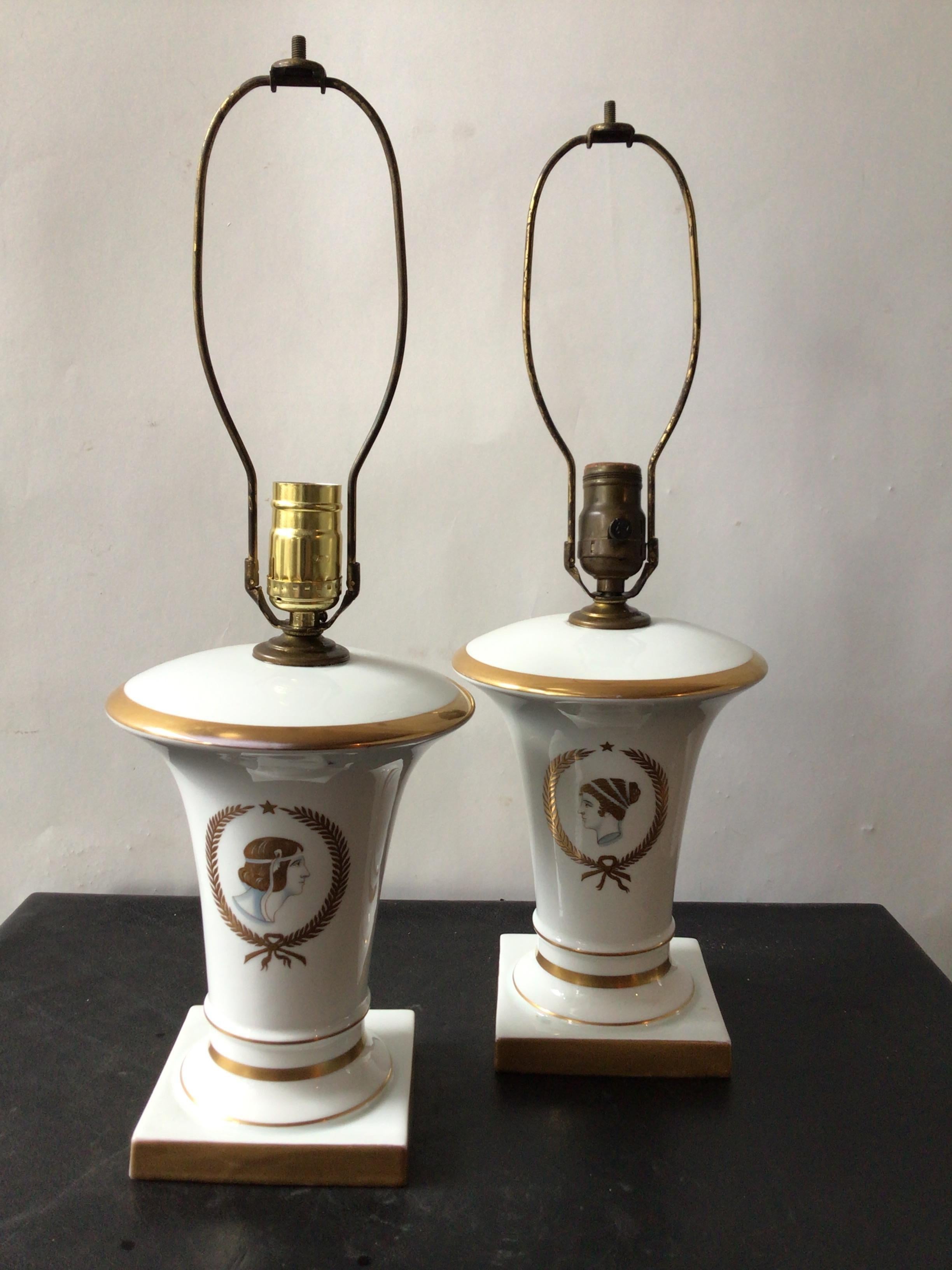 Pair of 1930s hand painted neo classical lamps on porcelain urns. Gilt trim.