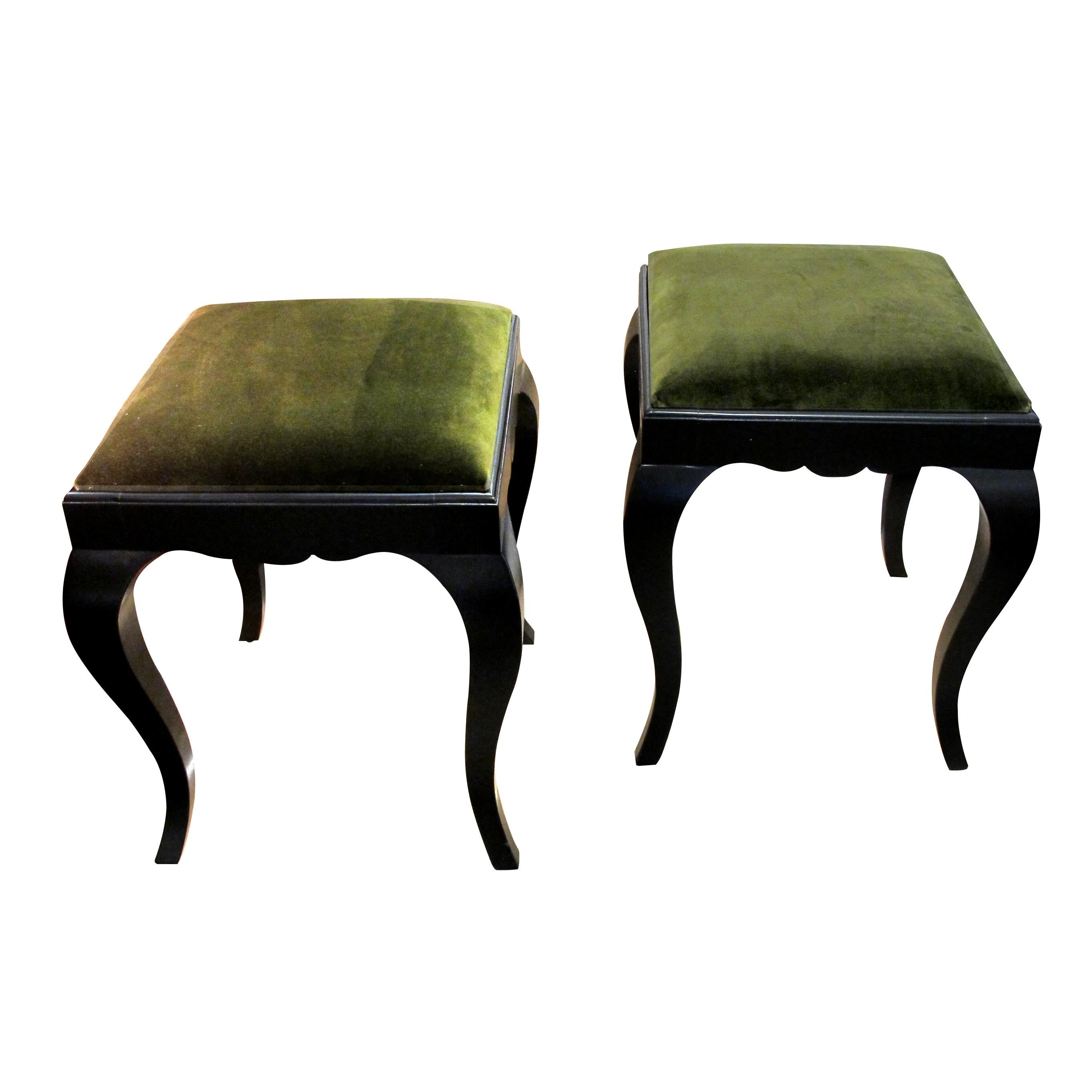 Pair of elegant 1930s well-made stools with generous curved legs. Newly reupholstered in a dark green velvet fabric which compliments the ebonized frame. 

Size: H: 48 cm x W: 43 cm x D: 43 cm.

