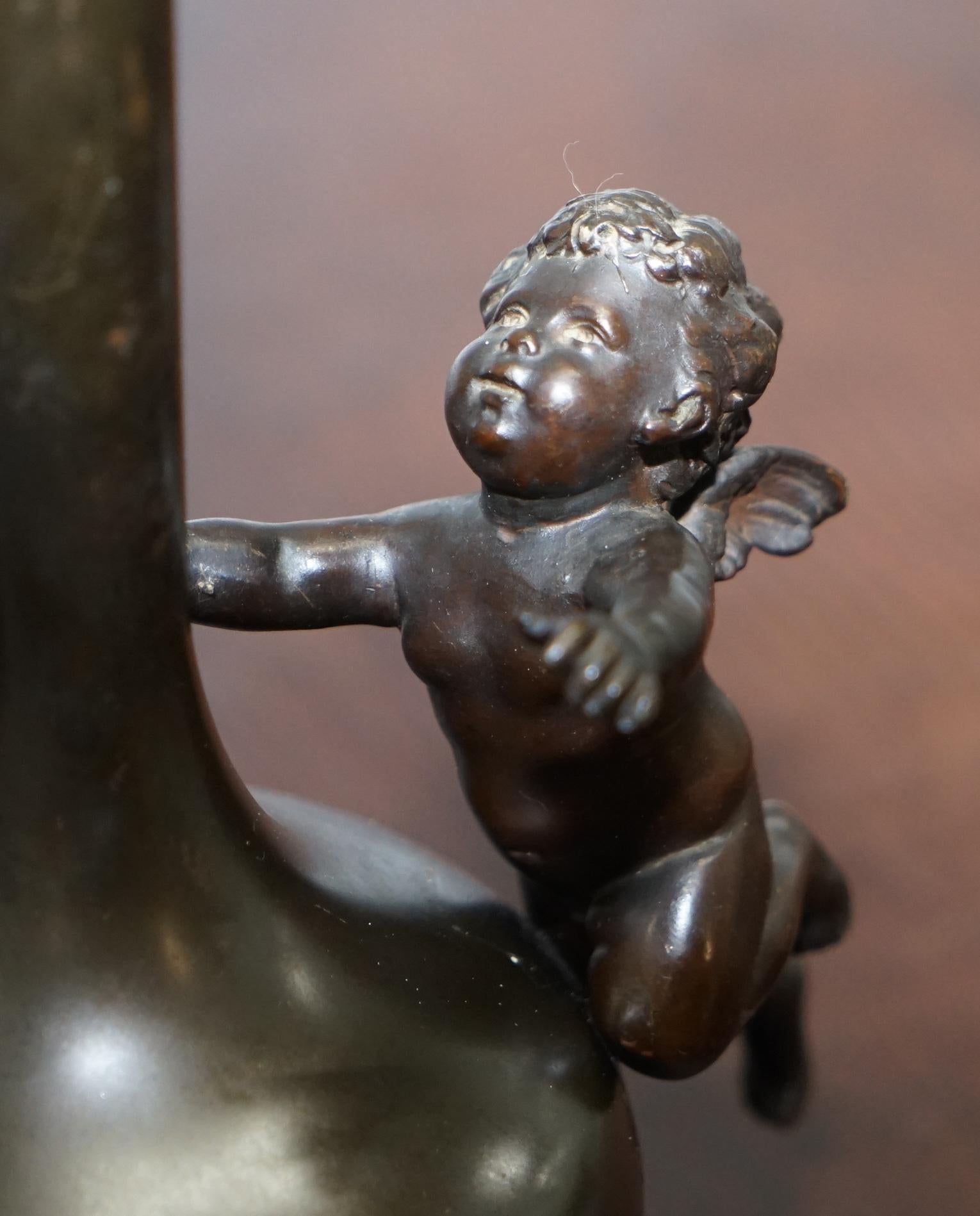 Chinese Export Pair of 1930s Vintage Bronze Jug Vase Urns with Little Cherub Angles Nice Find For Sale