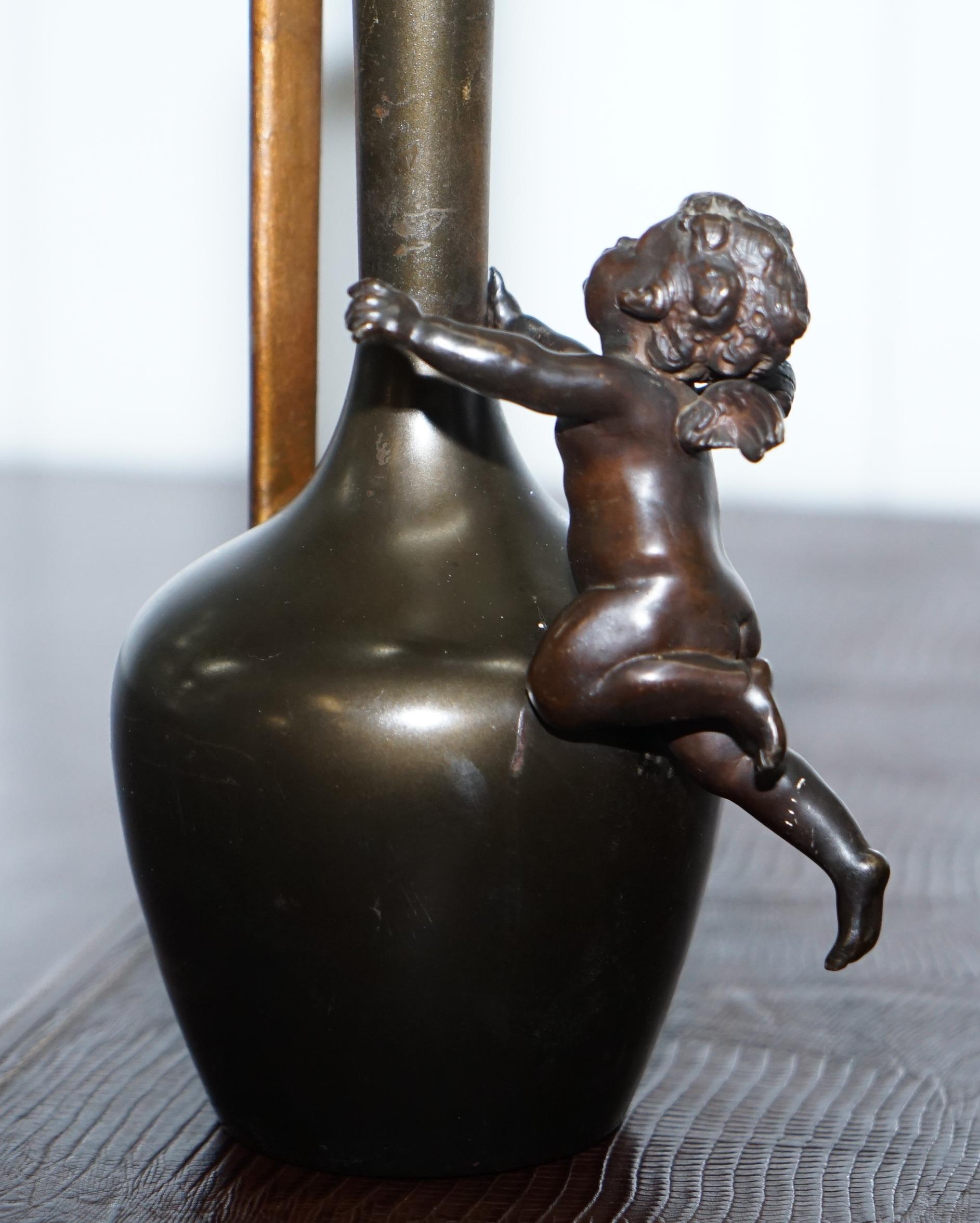20th Century Pair of 1930s Vintage Bronze Jug Vase Urns with Little Cherub Angles Nice Find For Sale