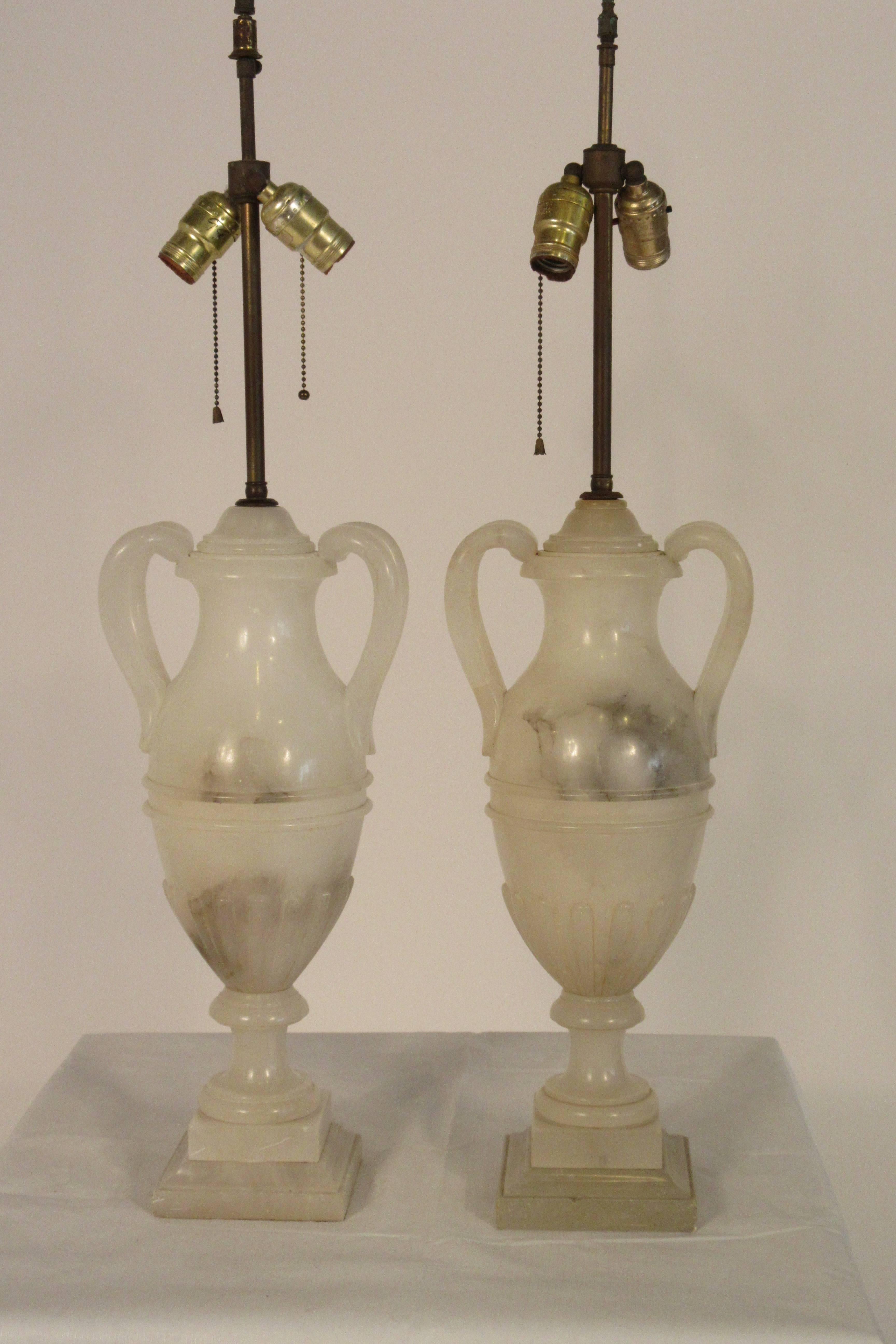 Pair of 1940s Alabaster classical urn lamps. The handles are so graceful. From a Rye, NY estate.
