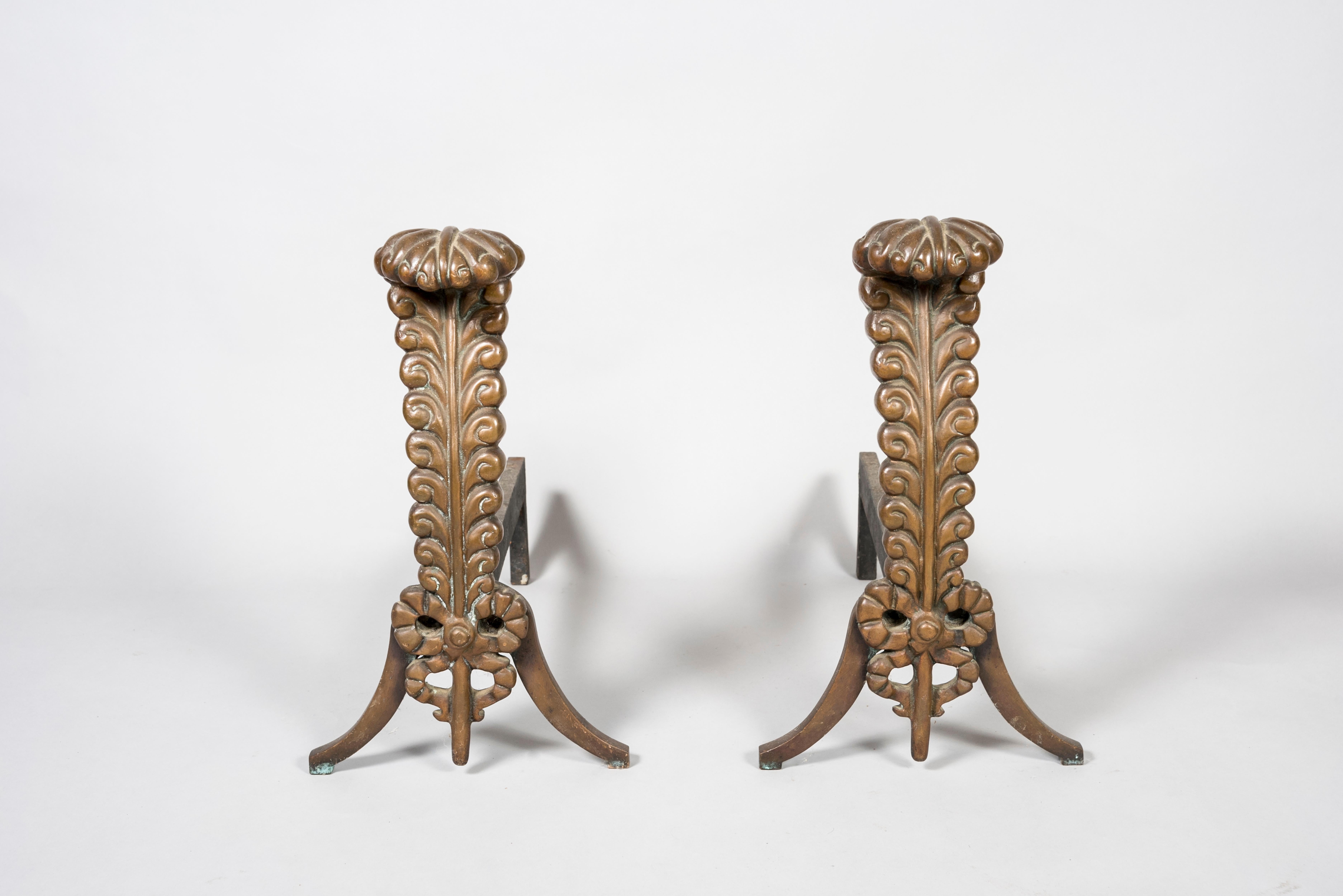 1940's Bronze andirons showing a stylish feather with a ribbon.
France.
In the style of Louis Sue et André Mare.