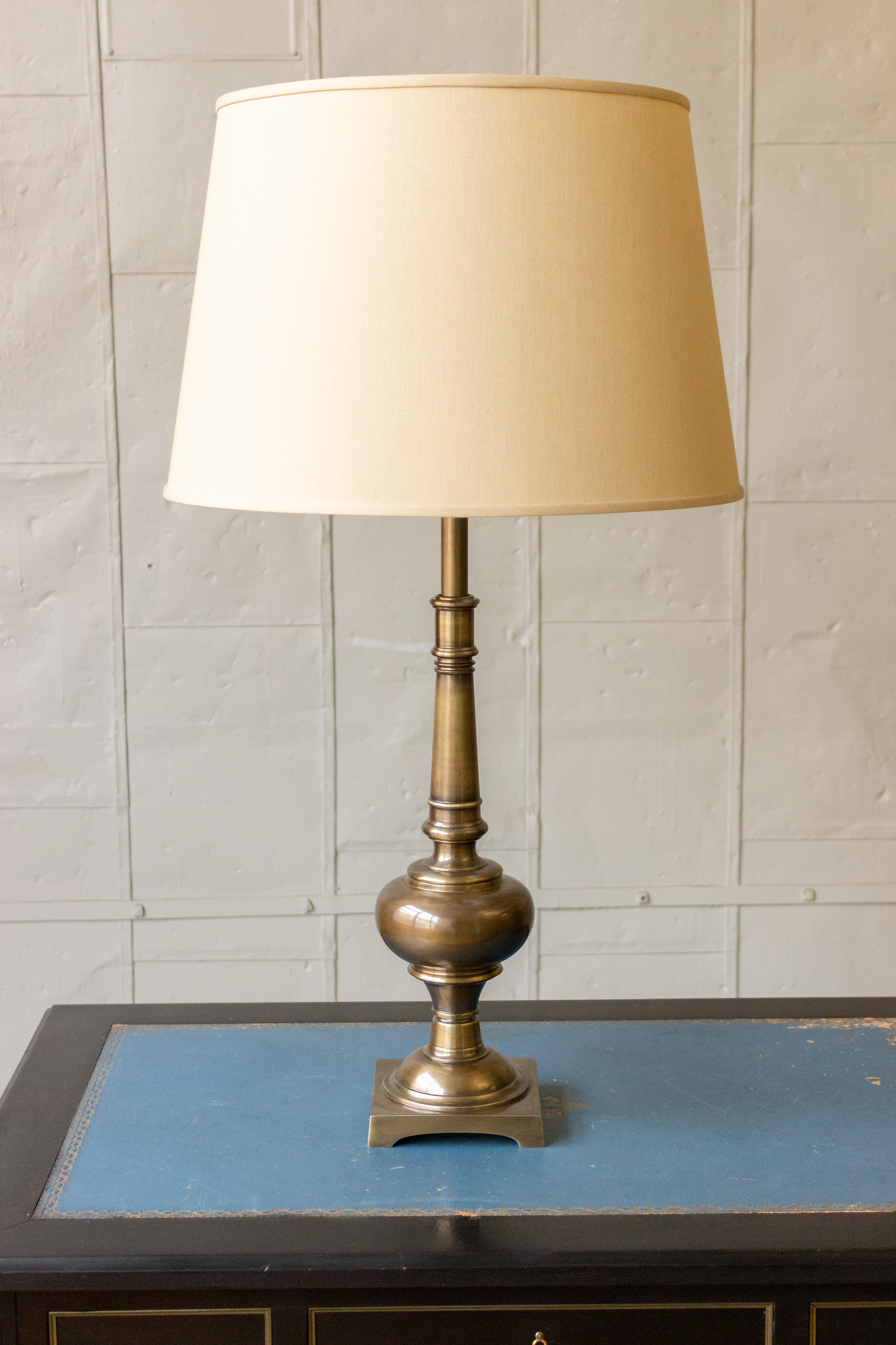 Pair of bronze plated (originally brass) table lamps with oil rub finish. New plating and new wiring. Photographed with display shade (not included).