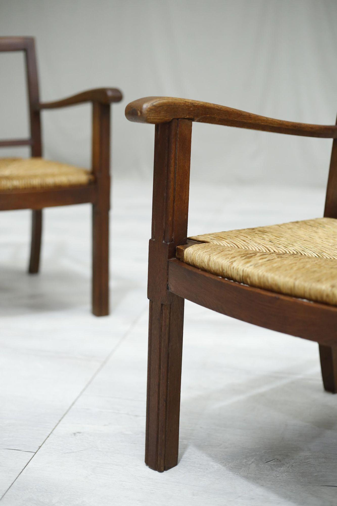 Pair of 1940's Brutalist Oak and Rush Seated Lounge Chairs In Excellent Condition In Malton, GB