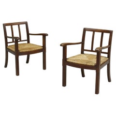 Pair of 1940s Brutalist Oak and Rush Seated Lounge Chairs