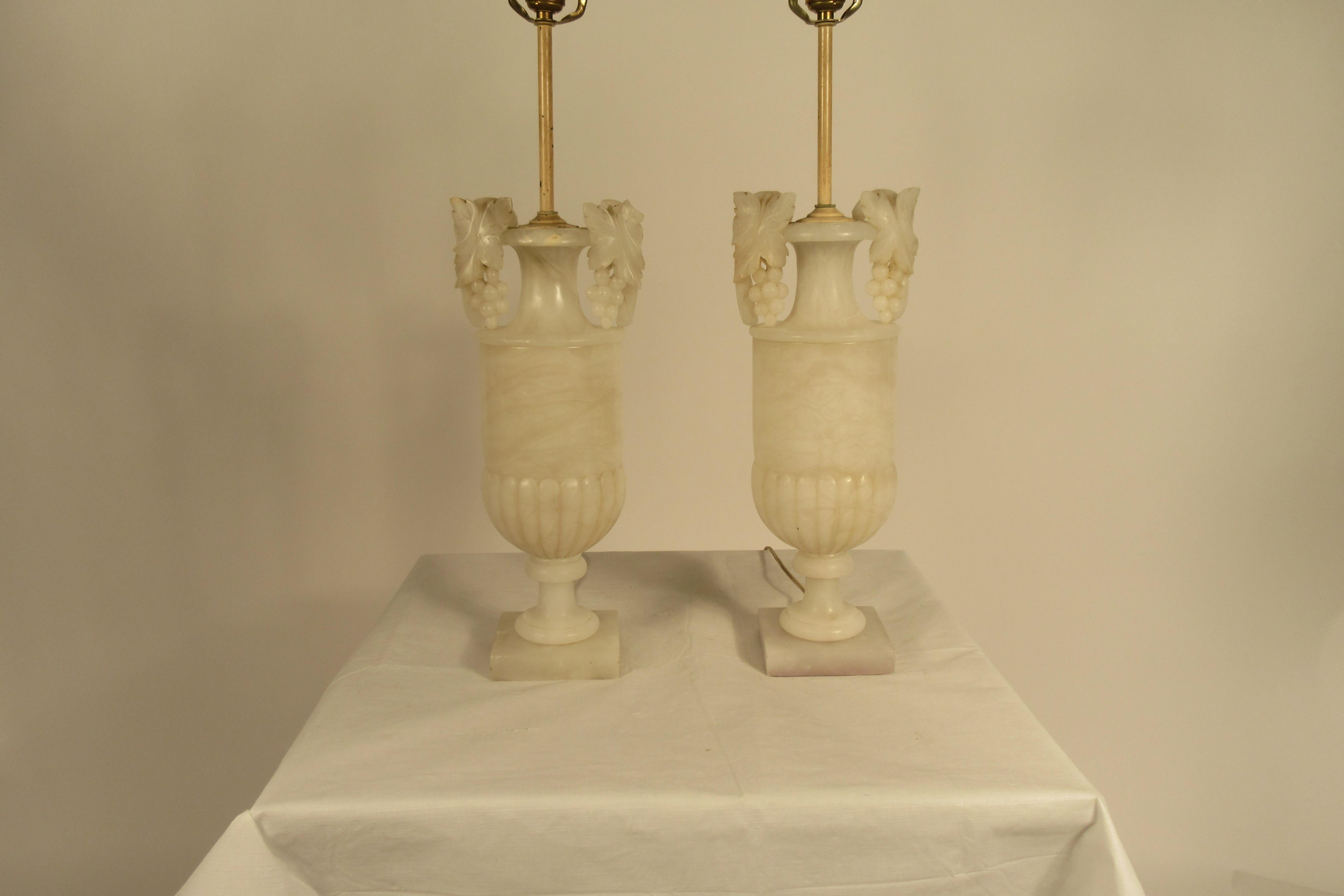 Pair of 1940s carved alabaster lamps with grape handles.