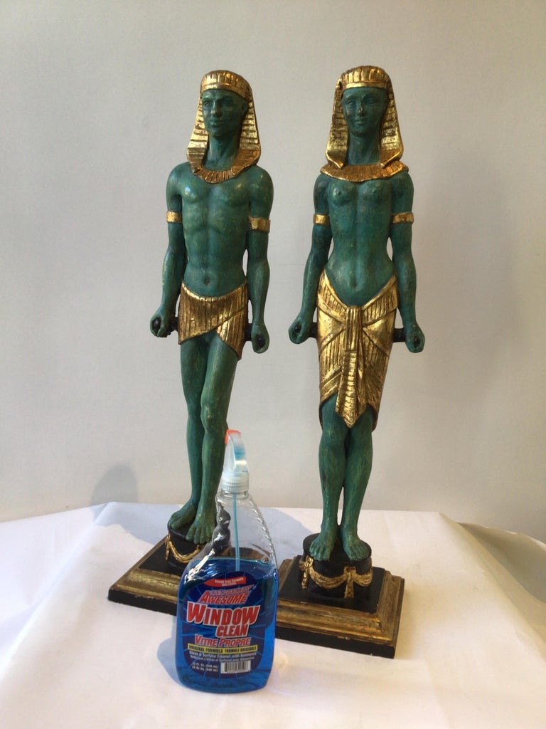 Pair Of 1940s Carved Gilt Wood Male And Female Egyptian Figures For
