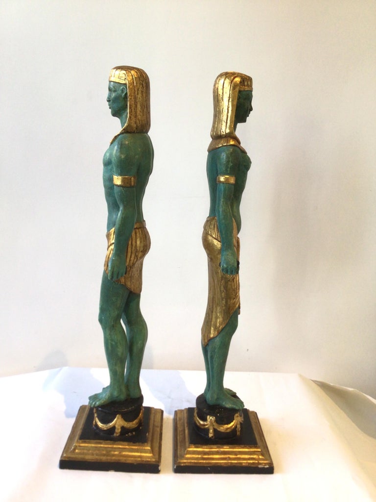 Pair Of 1940s Carved Gilt Wood Male And Female Egyptian Figures For