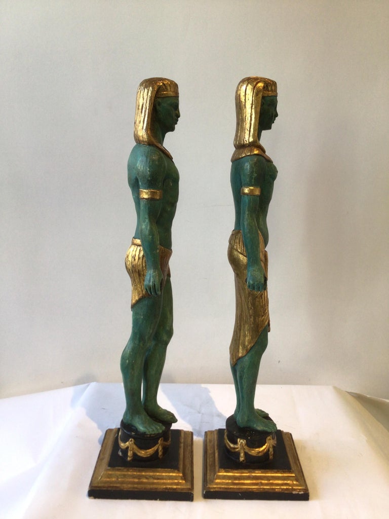 Pair Of 1940s Carved Gilt Wood Male And Female Egyptian Figures For