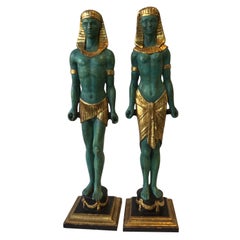 Pair Of 1940s Carved Gilt Wood Male And Female Egyptian Figures