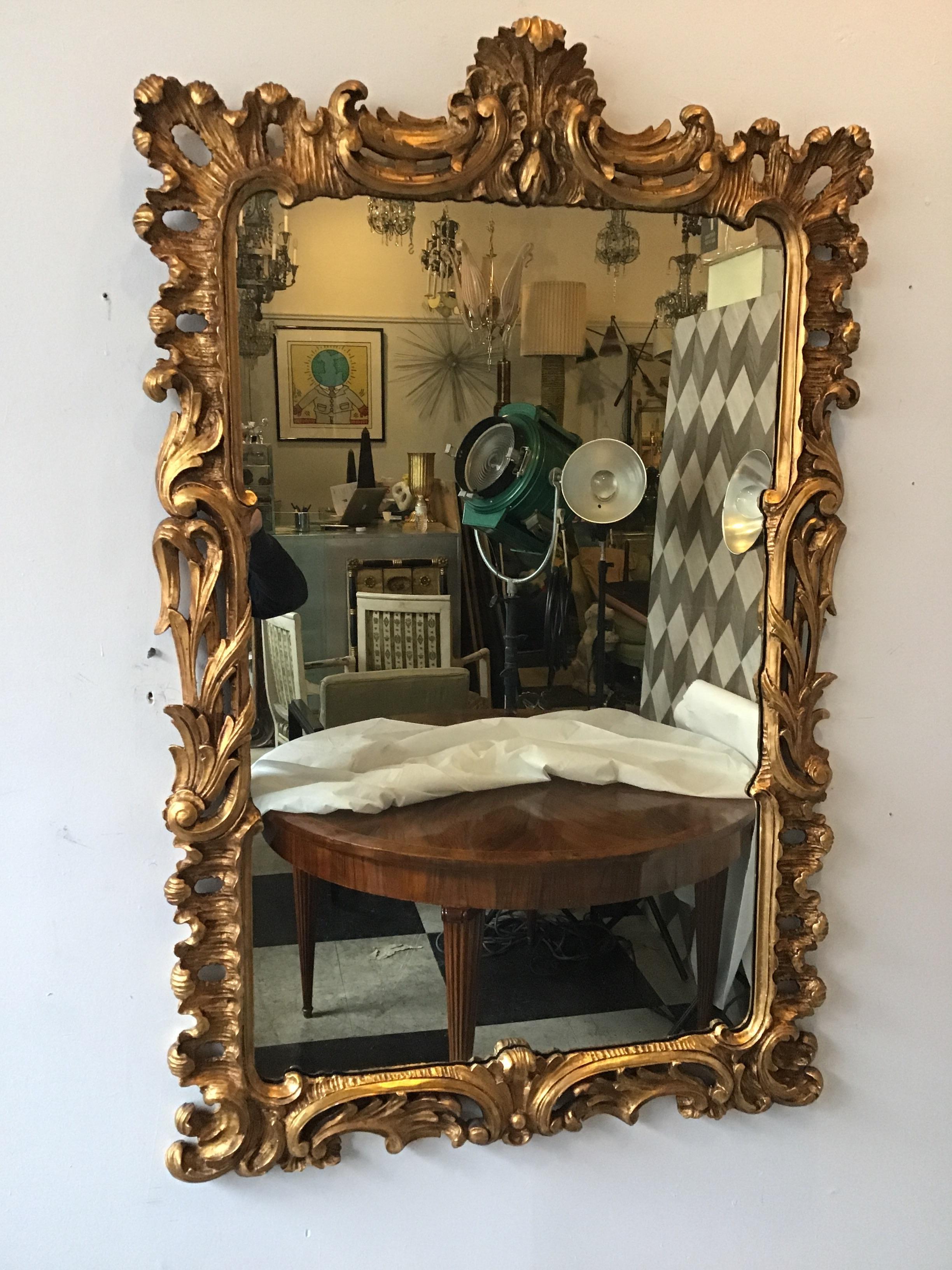 Mid-20th Century Pair of 1940s Carved Wood Gilt Mirrors