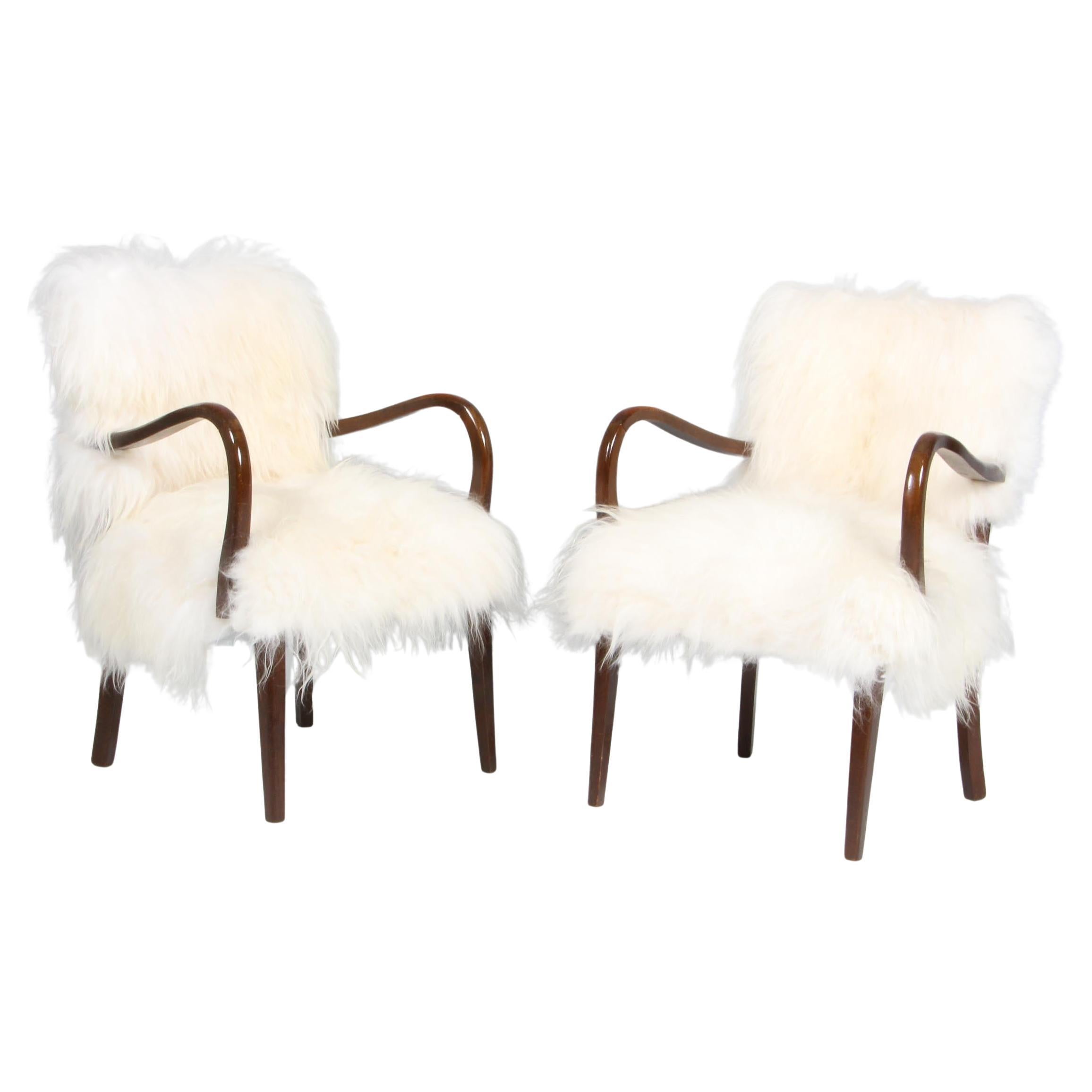 Pair of 1940s Chairs in longhaired lambskin, Denmark For Sale