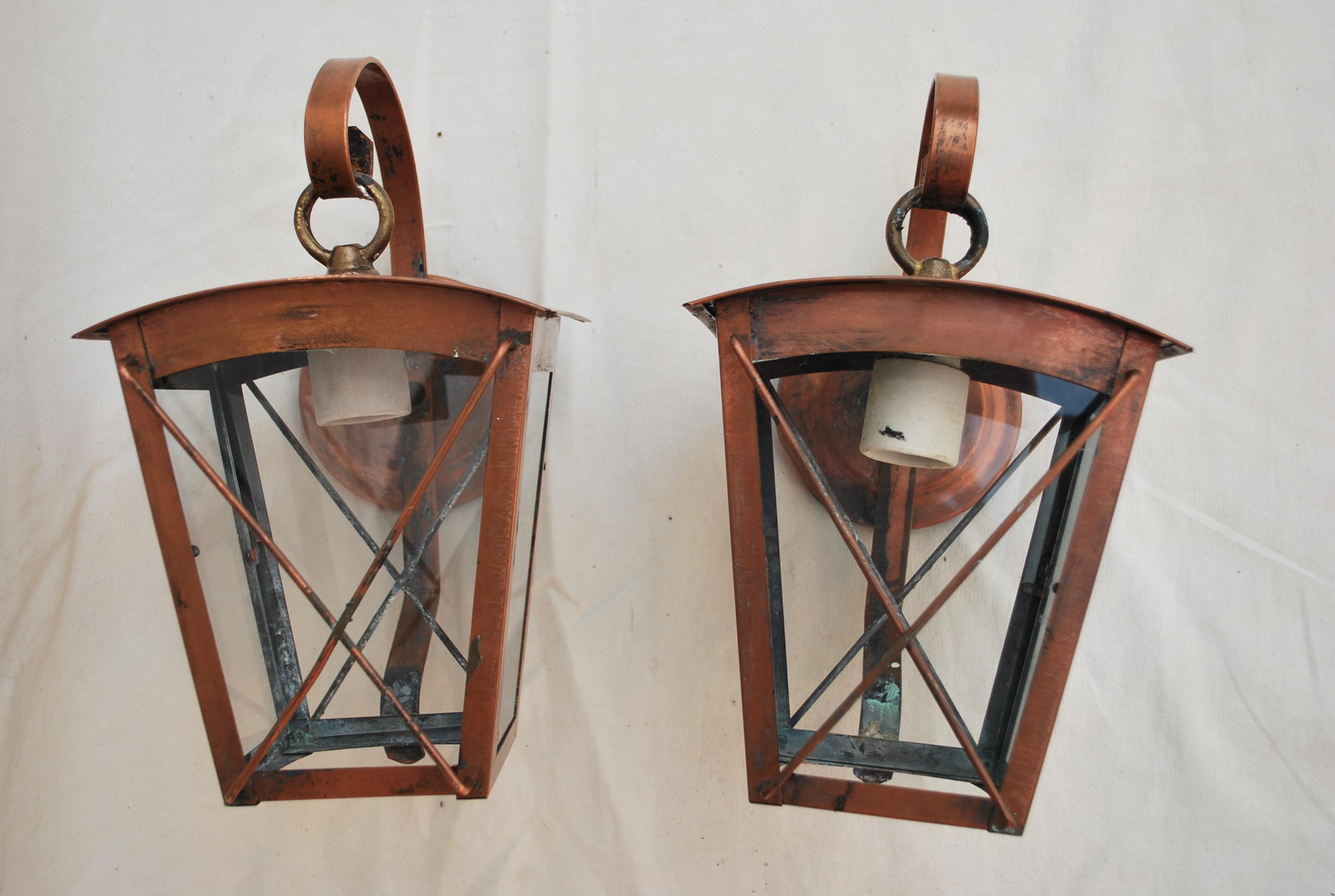 A very nice pair of 1940s copper outdoor or indoor sconces, they have been stripped , they had so many coats of paint when we find them, one winter and the copper will have a beautiful patina.