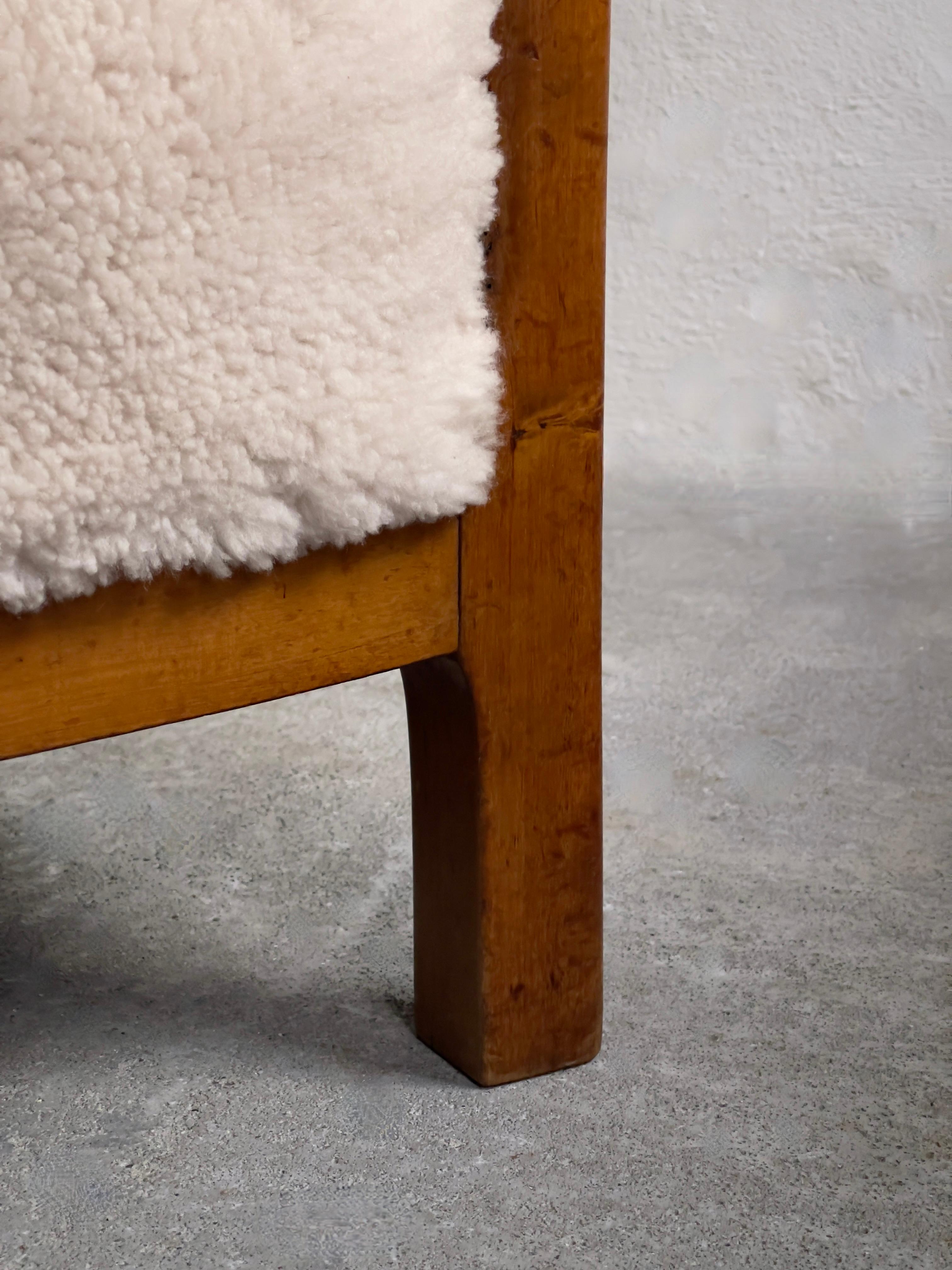 1940s pair of danish lounge chairs in solid flamed birch and premium sheepskin. 12