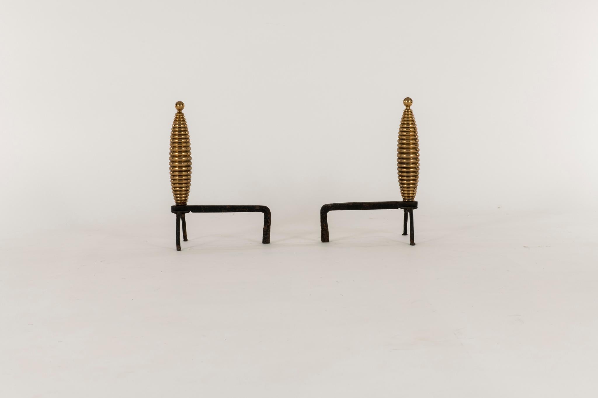A minimally chic pair of 1940s French brass andirons.