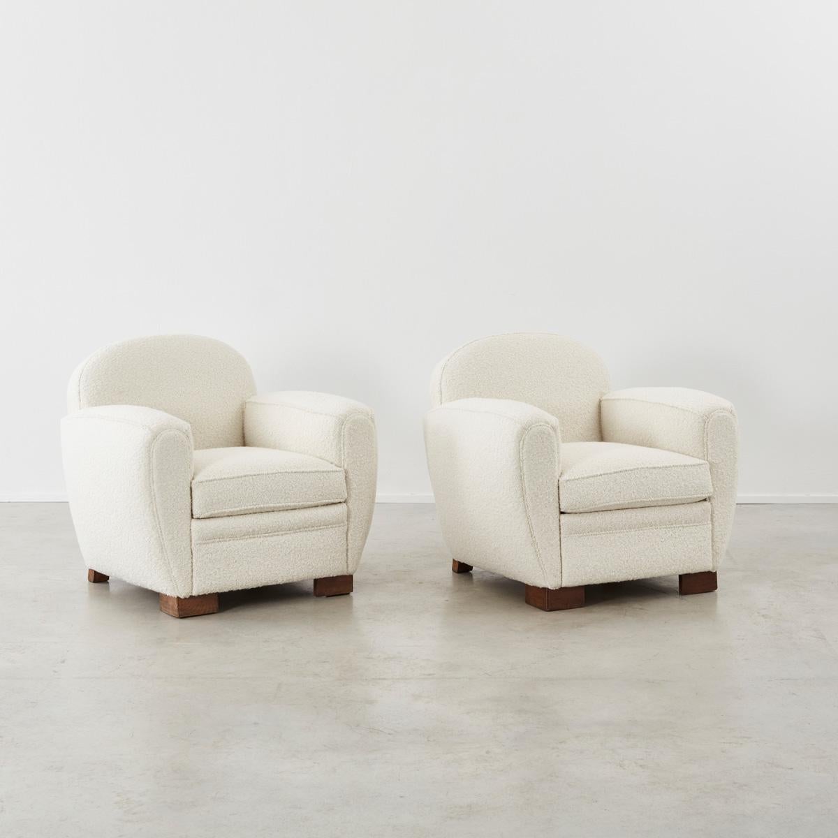 Newly upholstered in pale wool bouclé, these inviting armchairs are reminiscent of Jean-Michel Frank’s ‘modestly luxurious’ designs. Soft curves and comfortable proportions invite loungers to sit down and sink in.

Traditional sprung seats, wooden