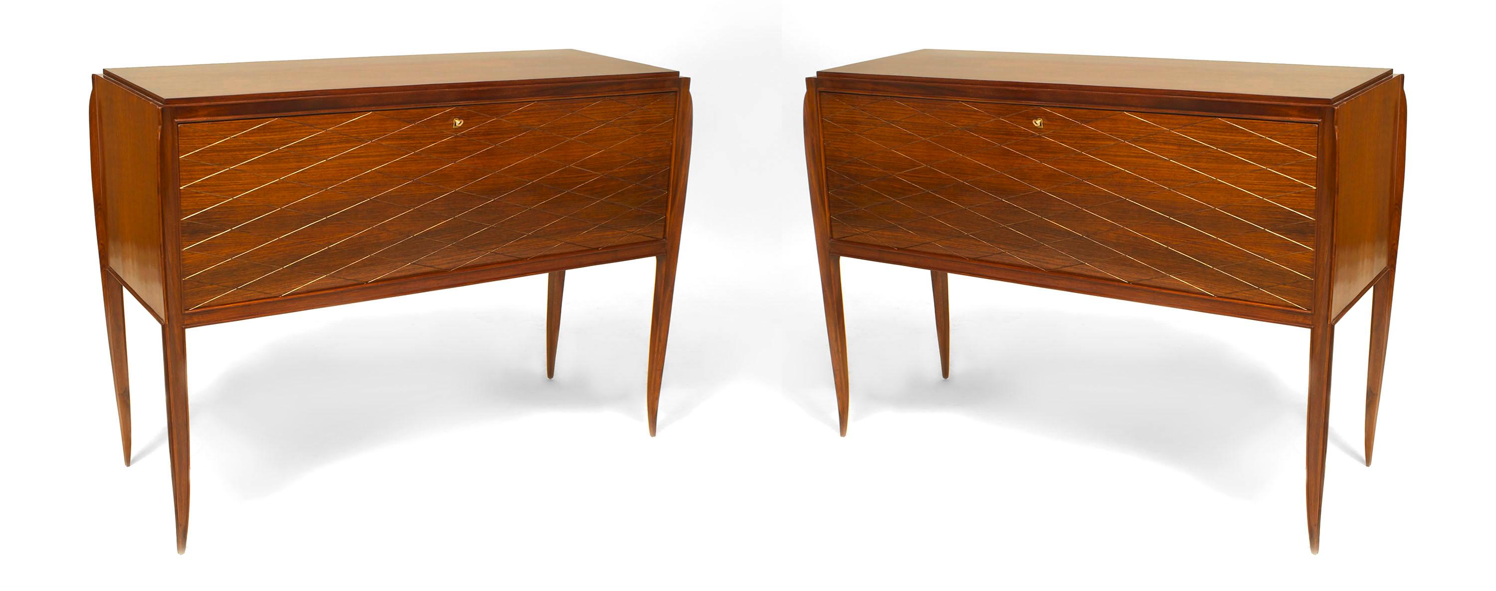 Pair of 1940's French commodes by Jean Pascaud. The commodes are composed of rosewood etched with a diamond pattern and fitted with a drop front door and sycamore and mirror lined interior.
