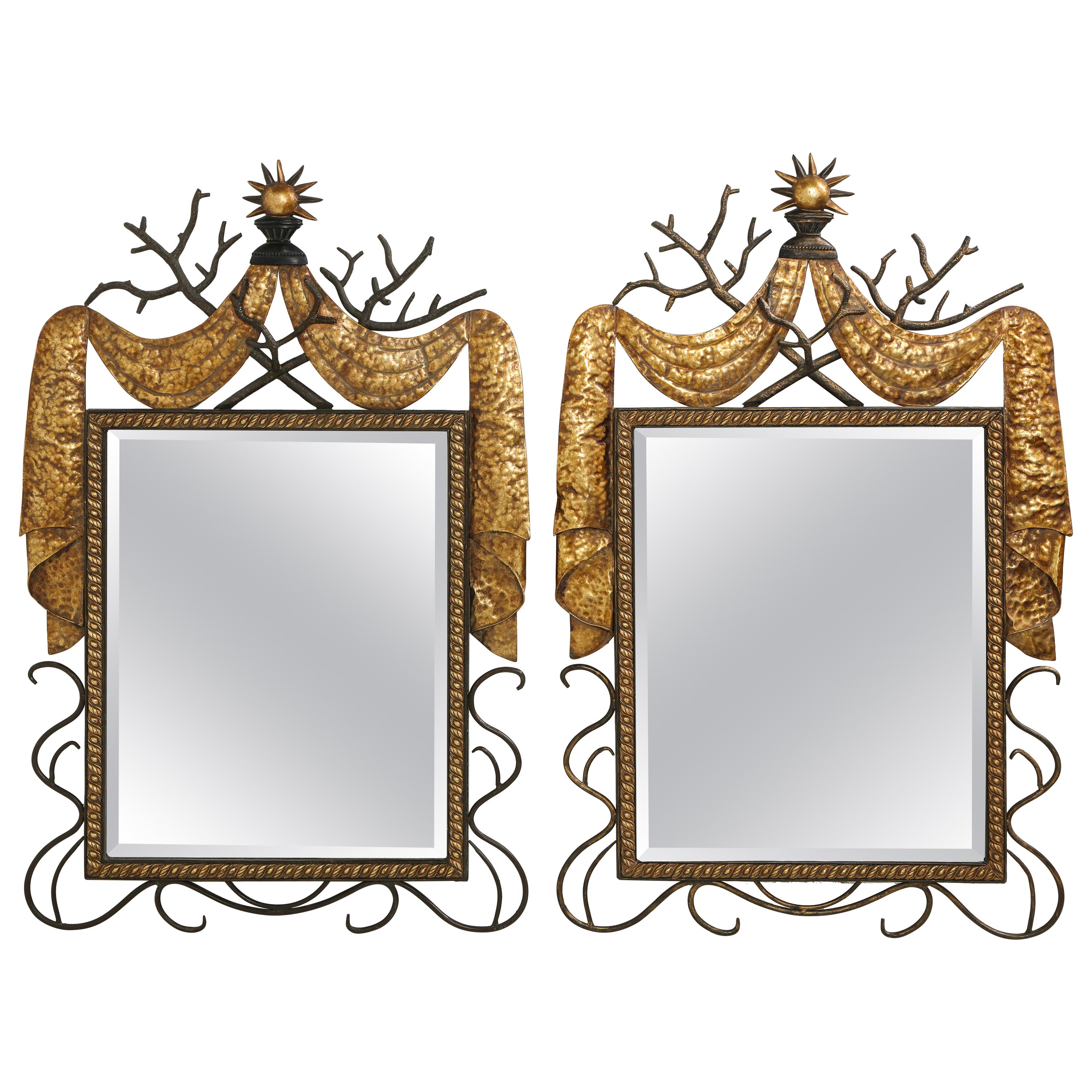 Pair of Gilbert Poillerat Style Parcel-Gilt and Black Iron Wall Mirrors