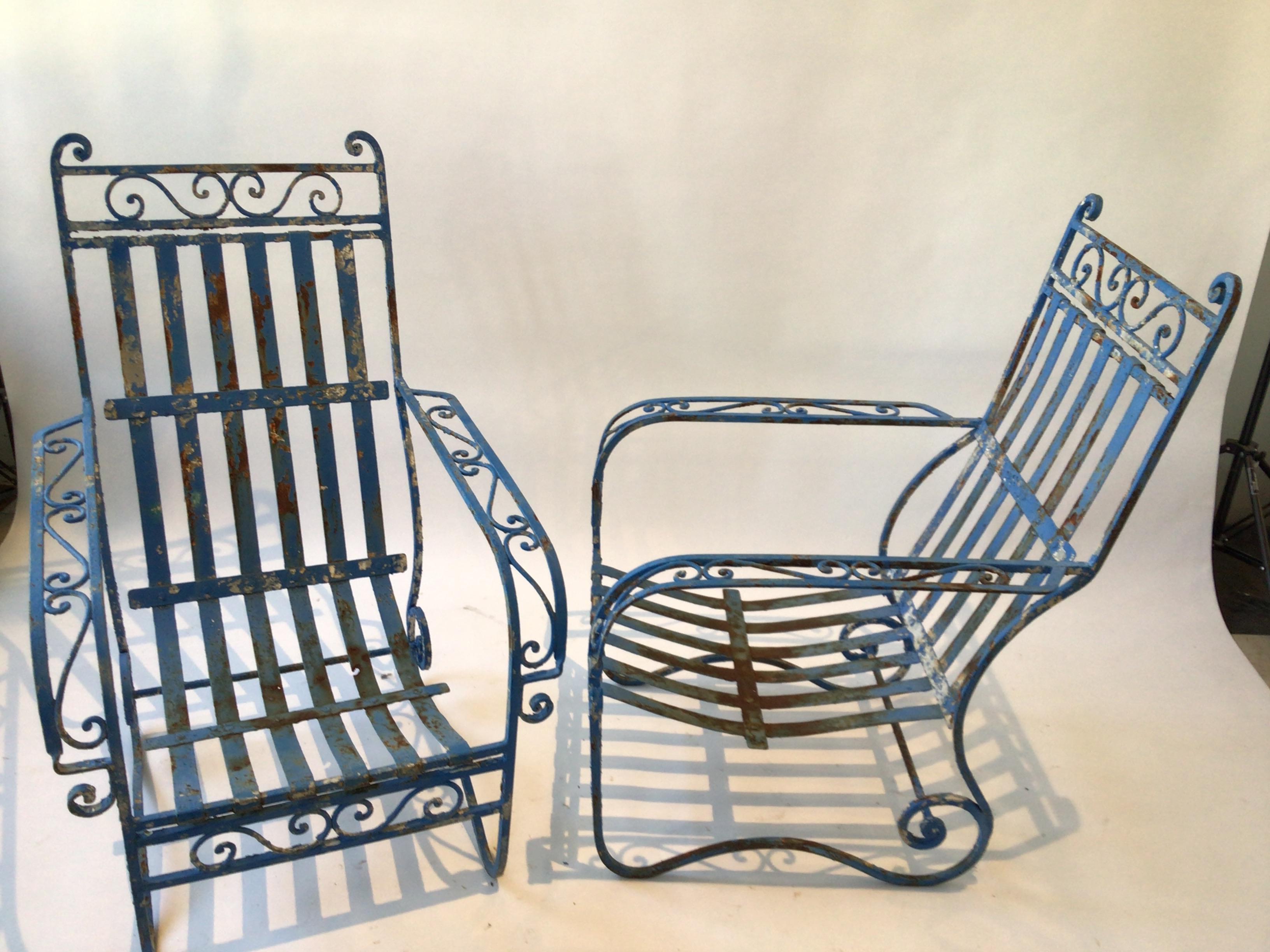 Pair of French 1940s wrought iron garden armchairs.Needs repainting.