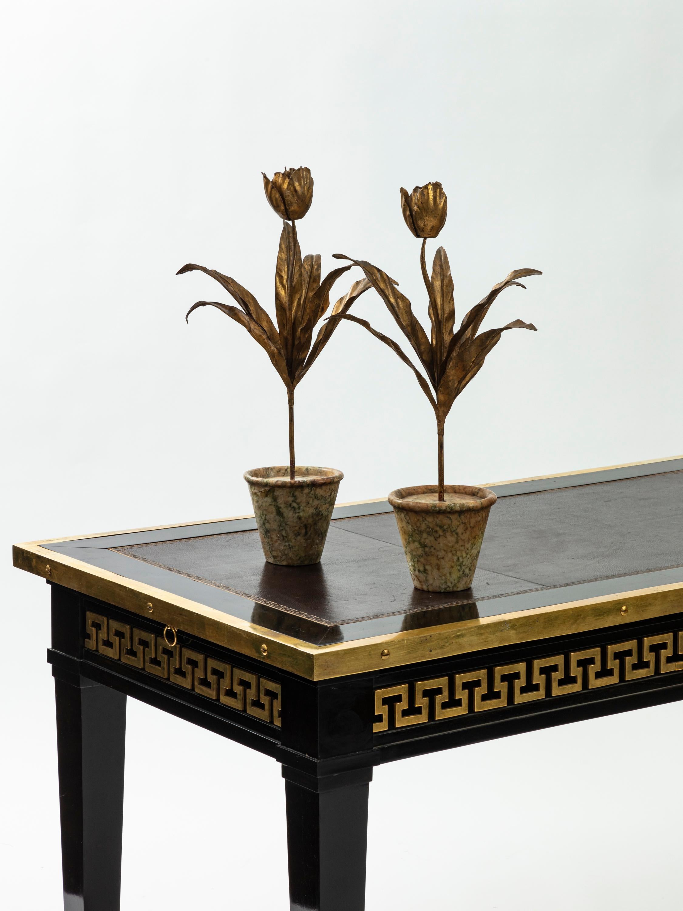Pair of 1940s gilded metal tulips on beige yellow and olive green marble planters.