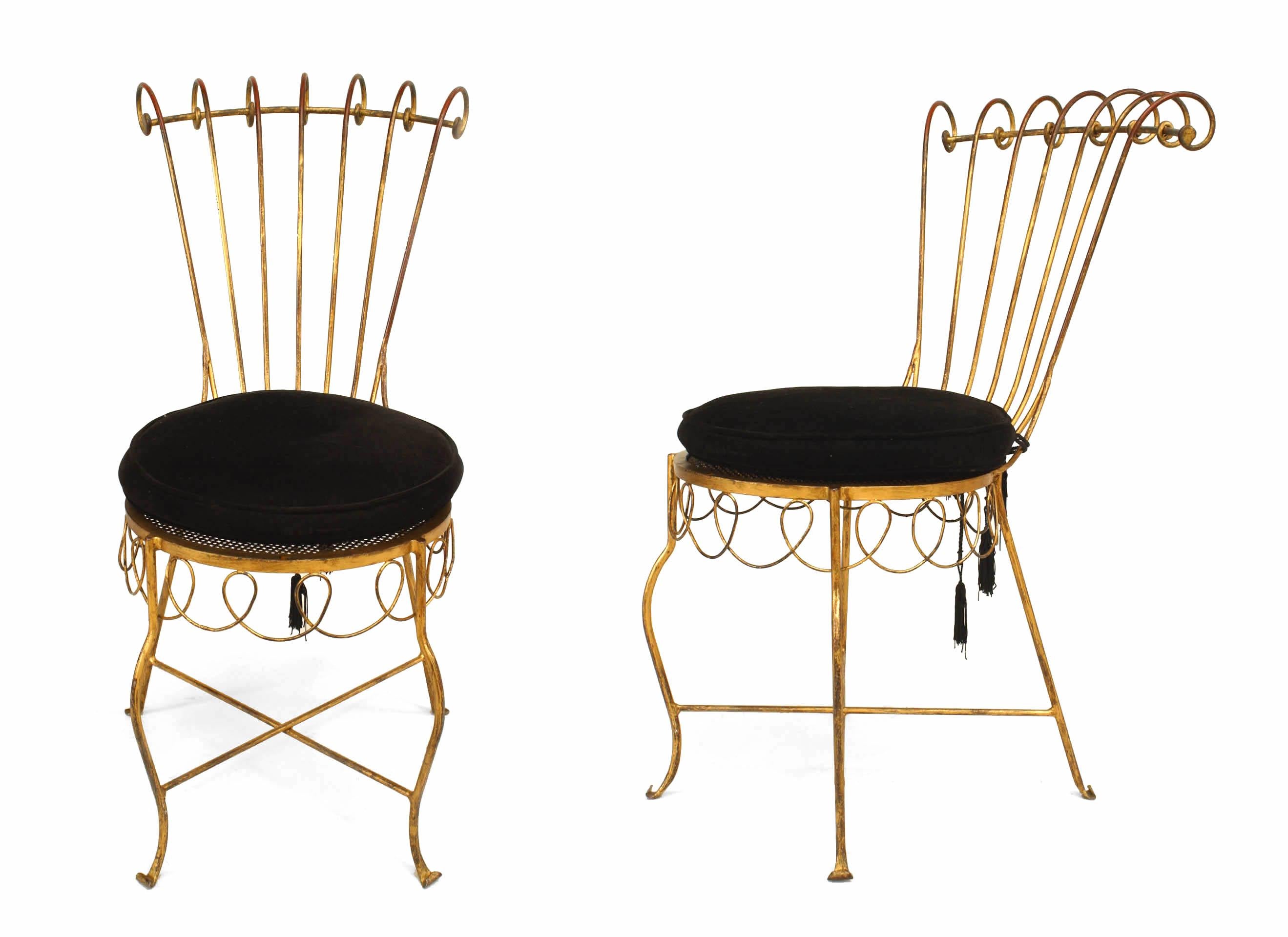 Pair of French 1940s gilt metal side chairs with open scroll design back and woven apron under seat with a stretcher.

