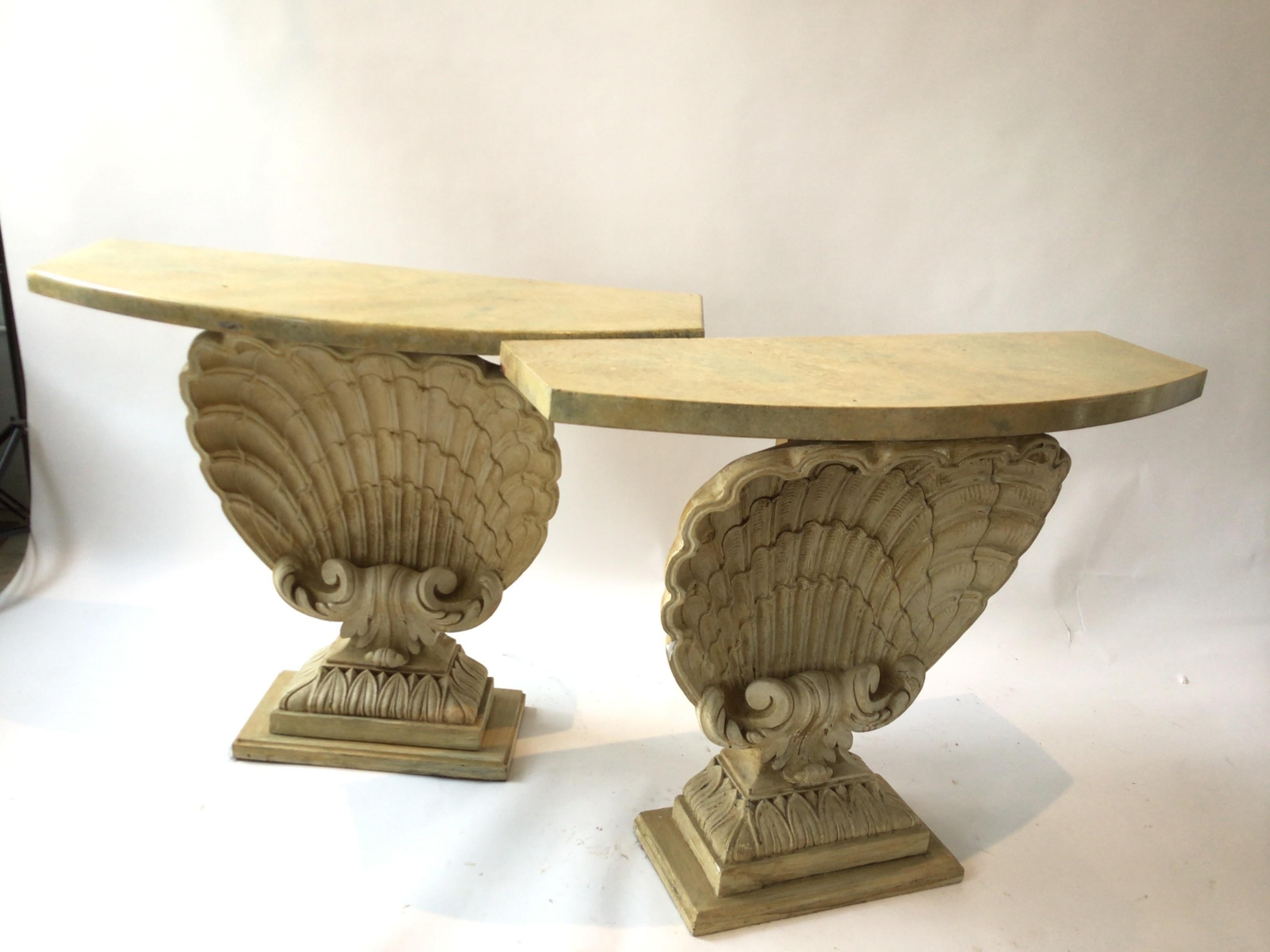 Pair of 1940s Grosfeld House shell consoles Faux marble wood tops, plaster shells.