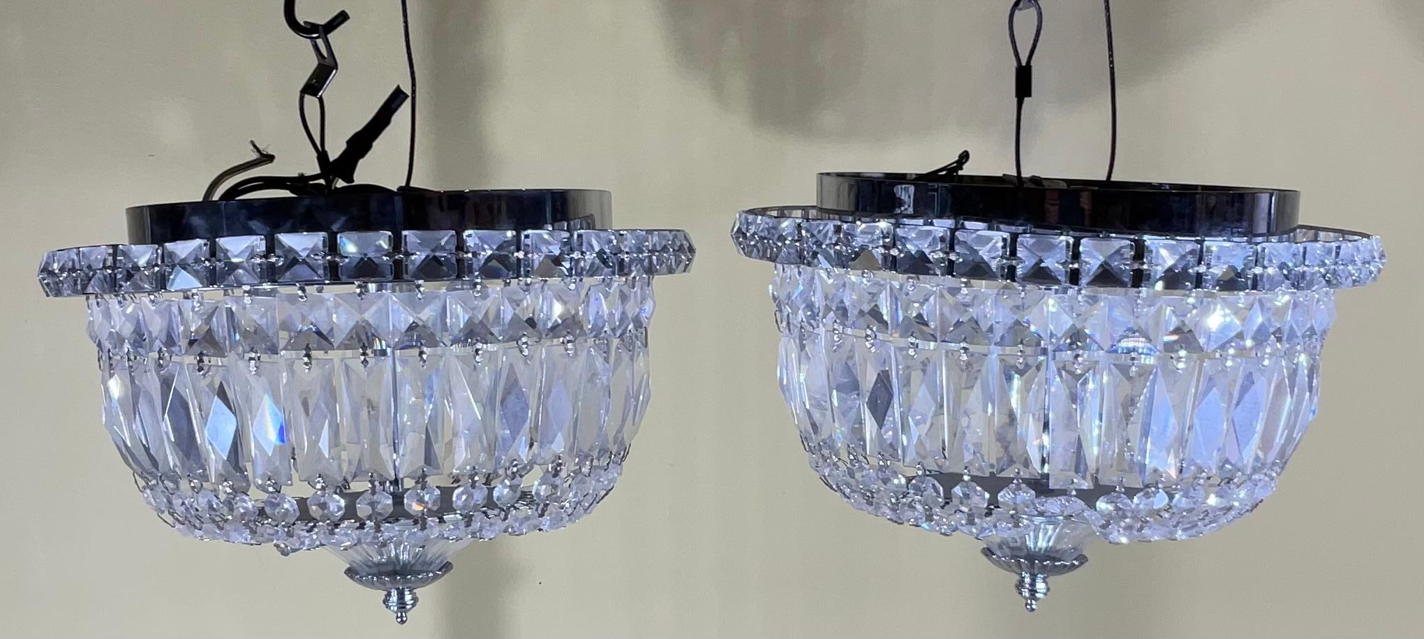 Pair of 1940's Hollywood style Cut Crystal drop-down flush mount dome chandelier with crystal and silvered fittings. This elegant flush mount chandelier features a band of numerous square diamond cut crystals that are attached to its silvered