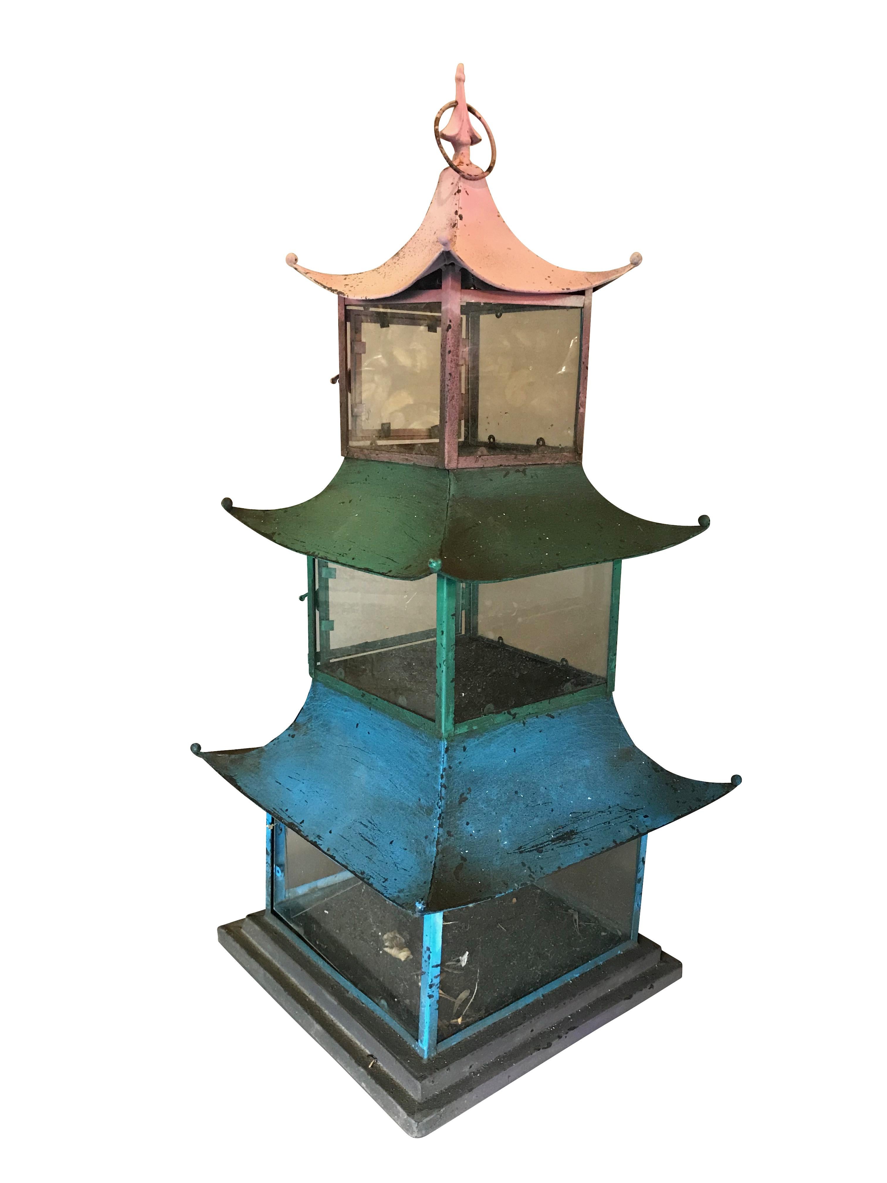 Pair of 1940s Japanese painted pagoda/lanterns.

Having the original paint and glass 

Measures: Height 36